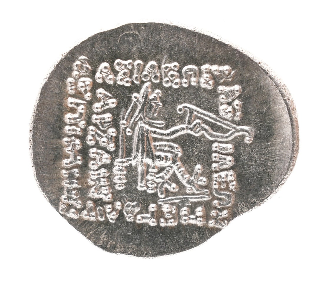 Mithridates II Parthian Drachm Silver Coin: Ancient Parthian Kingdom silver coin. Weighs 4.1g. Measures 19.73mm. Obverse: Bust left, wearing tiara decorated with eight-rayed star; torque ends in pellet. Doted border. Reverse: Archer (Arsakes I)
