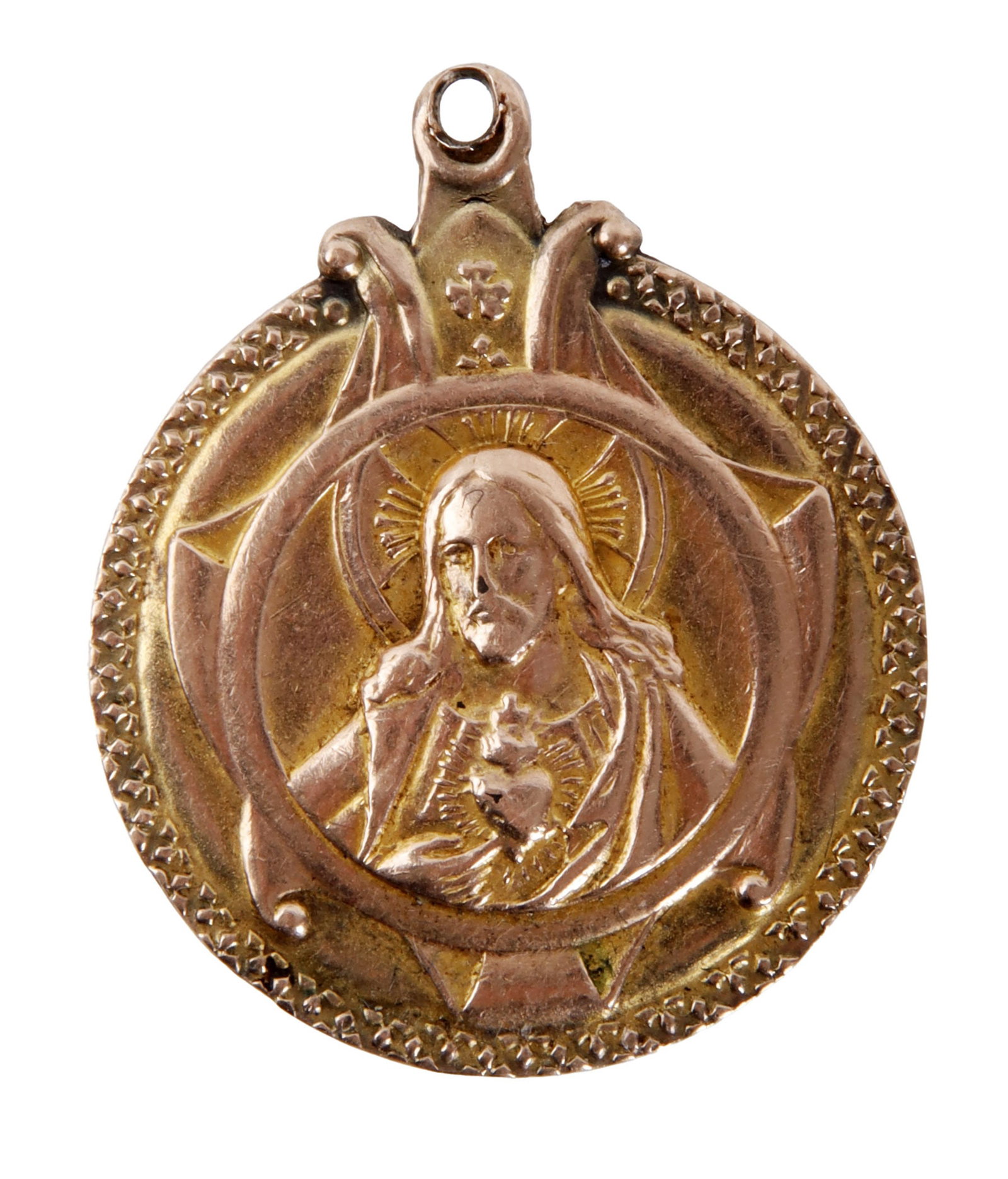 Gold Jesus and Mary Pendant Sacred Heart Antique: An antique pendant depicting an image of Mary on one side and an image of Jesus with Sacred Heart. Unmarked, but tests as gold fill. Approximate 1 inch diameter. Weighs 5.3 grams. | This lot has a res