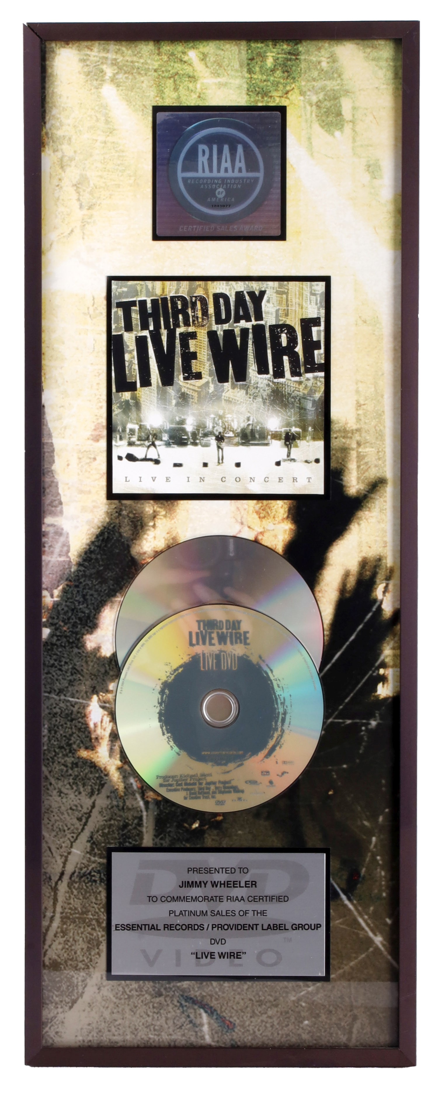Platinum Album Award for Third Day's Live Wire: A Platinum Album award for Third Day's Live Wire. Presented to Jerry Wheeler, formerly of Sony. 9x23.5 inches. | This lot has a reserve.