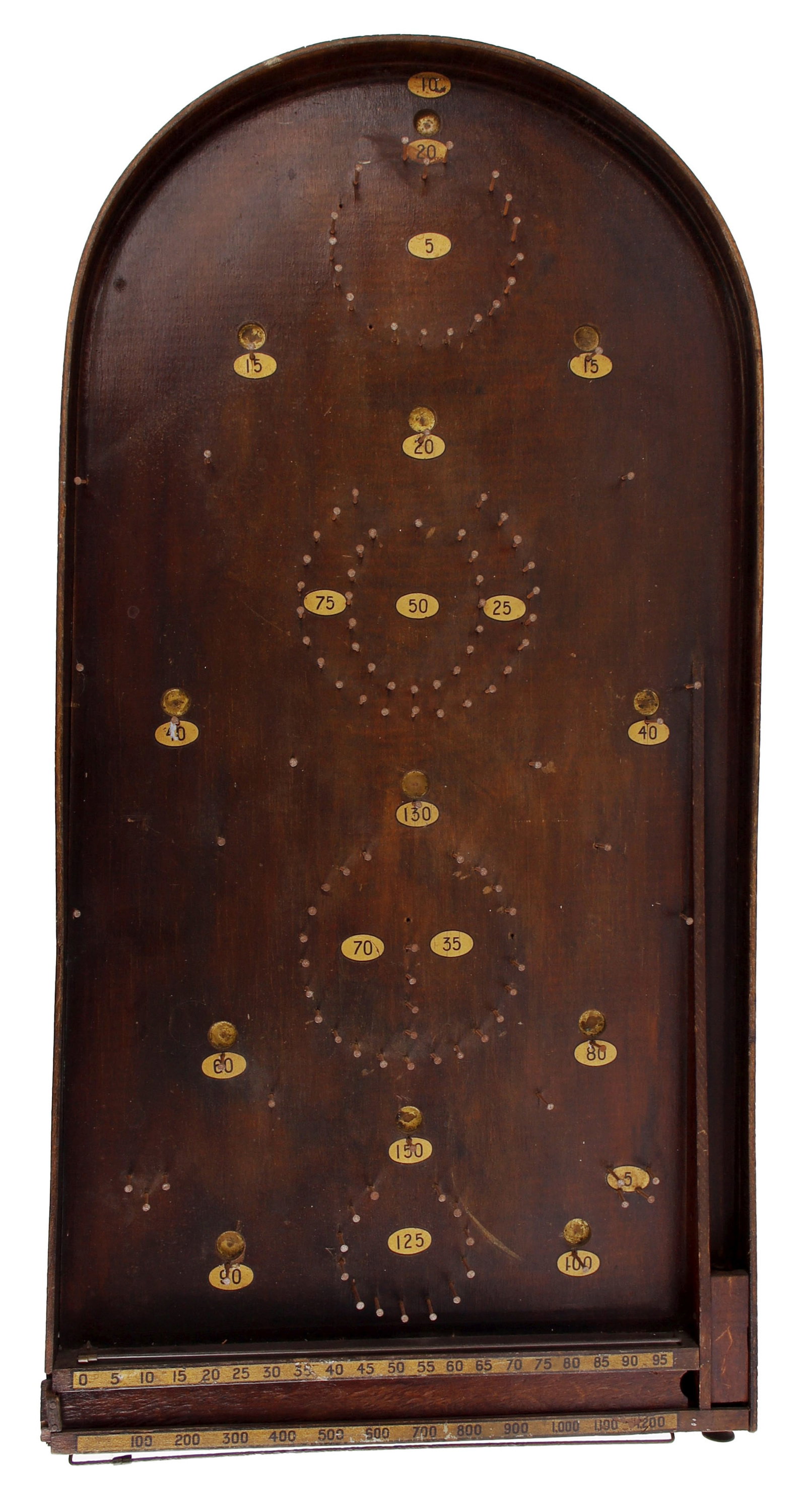 Early Tabletop Bagatelle Board with Marbles: A late 19th to early 20th-century antique tabletop bagatelle board, featuring a classic arched top and flat-bottomed frame. Constructed from dark-toned wood, the board retains its original mechanical 