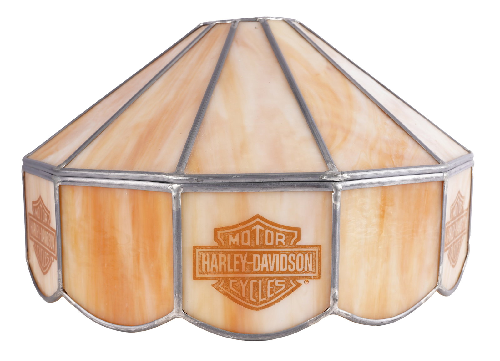 Harley Davidson Slag Glass Lamp: A slag glass lamp featuring the branding of Harley Davidson Motor Cycles. Cream in color. Top crown is missing, but this is a normal modification to the lamp for alternate tops or for hanging. 14 inch