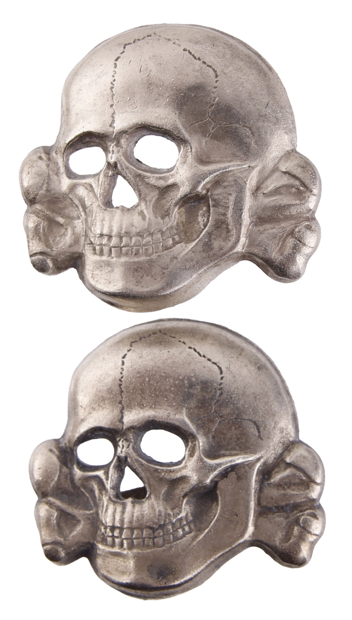 2 SS Officer Totenkopf Visor Pins WWII German: Lightweight aluminum construction. Both marked RZM 499/41. They measure 1 inch. | This lot has a reserve.