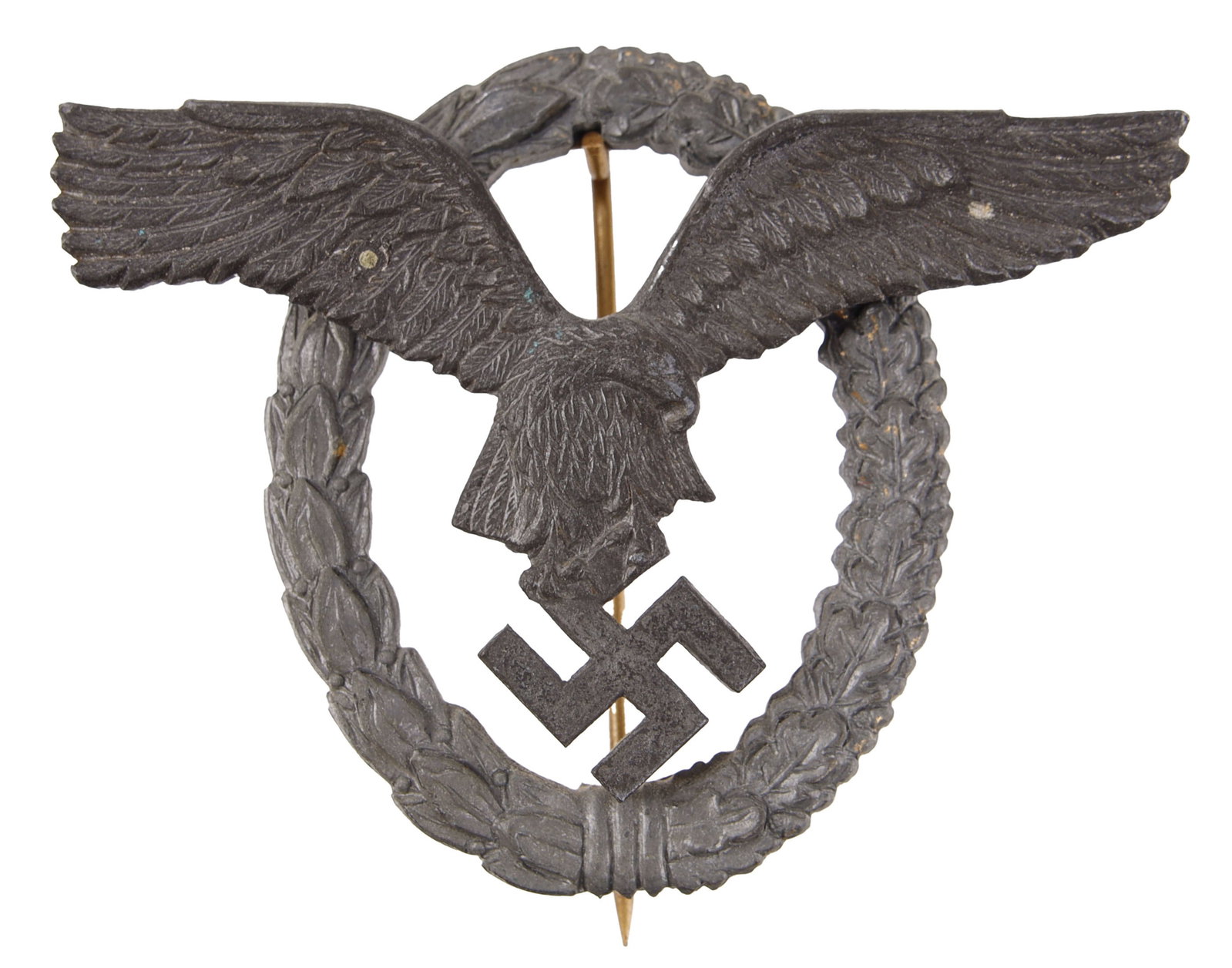 Early Souval L/58 Luftwaffe Pilot-Observer Badge: Early post-war Rudolf Souval Luftwaffe Pilot-Observer badge. Zinc construction with reverse having a tiny incuse relief mark "L/58." Multi-piece, with eagle affixed to wreath with two bent wire studs.