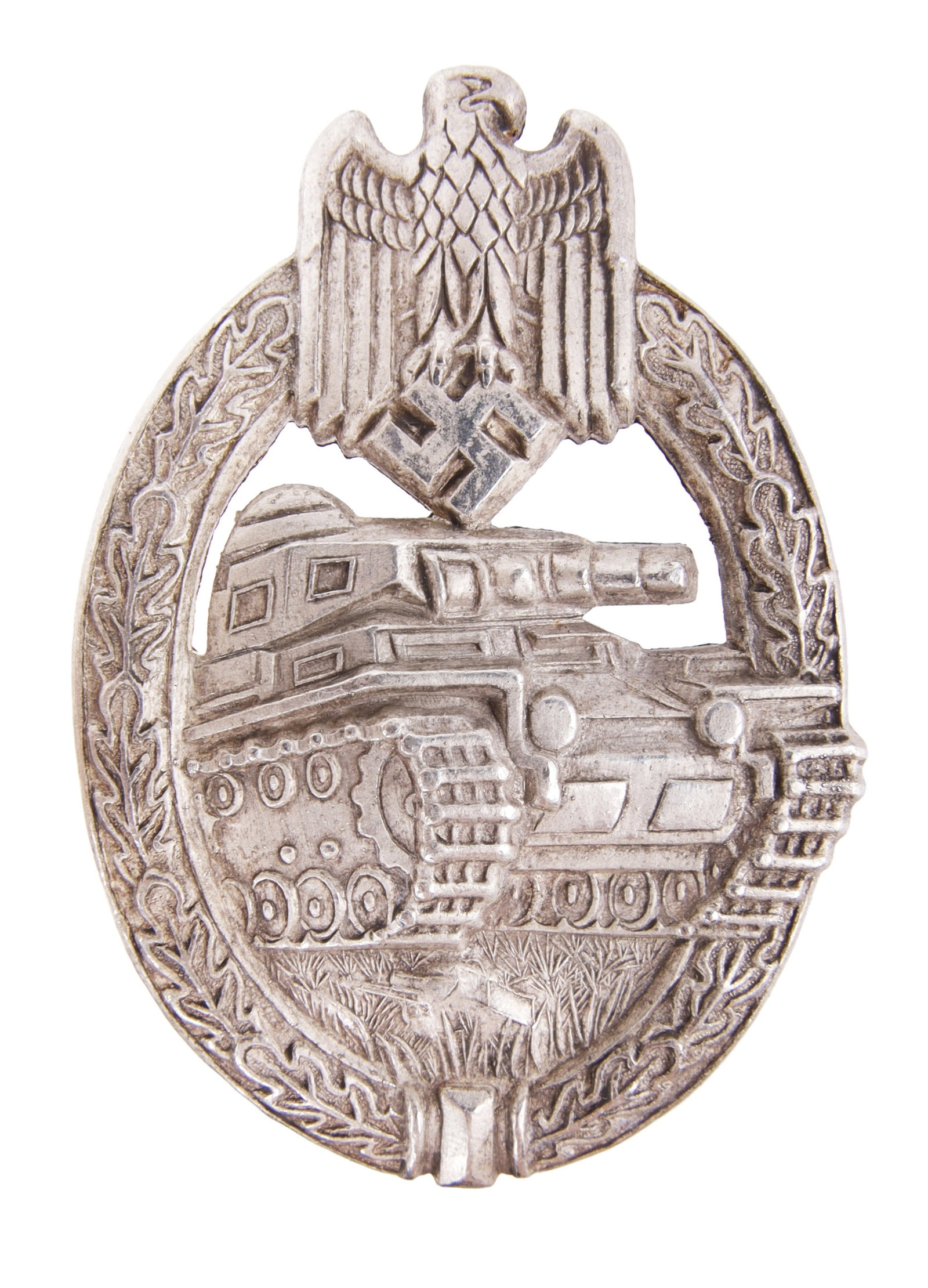 Silver Grade Panzer Assault Badge WWII German: Silver grade with factory finish present. Army eagle insignia with tank and oak leaves. Hermann Aurich make. It measures 2 3/8 inches.