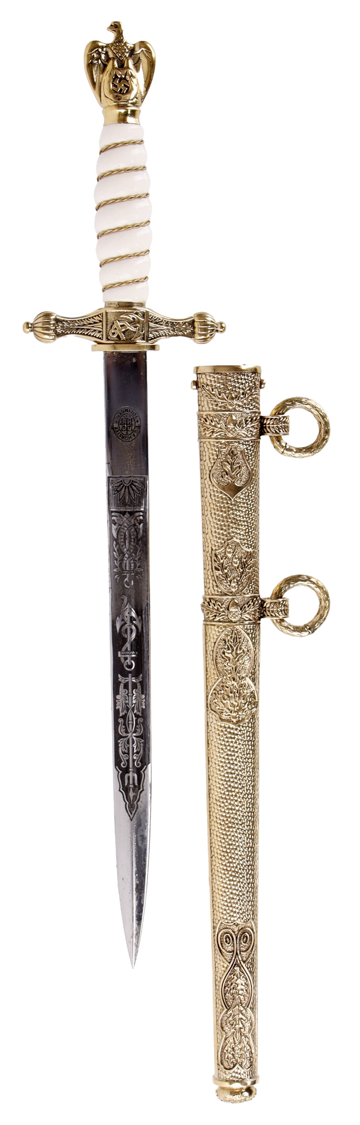 Kriegsmarine Etched Presentation Dagger WWII: An etched presentation dagger for an officer within the Kriegsmarine. Horster marked. Faux ivory handle, with a pommel that displays an eagle and swastika.