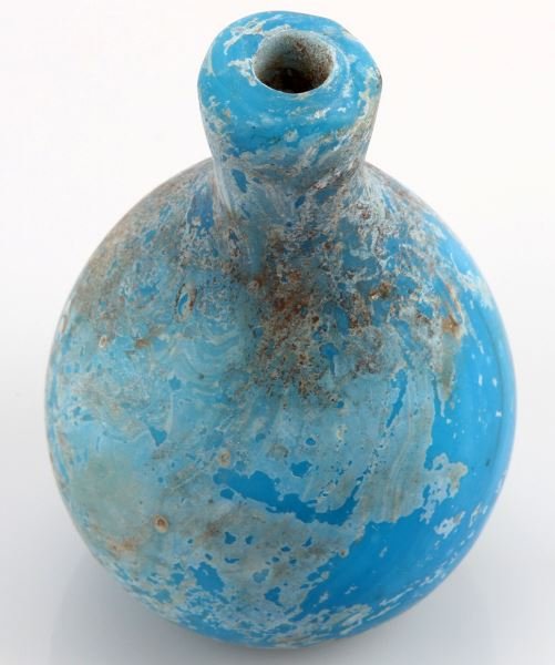 TURQUOISE ROMAN EGYPT GLASS PERFUME BOTTLE: Blown opaque glass, measuring four inches, very good excavated condition.