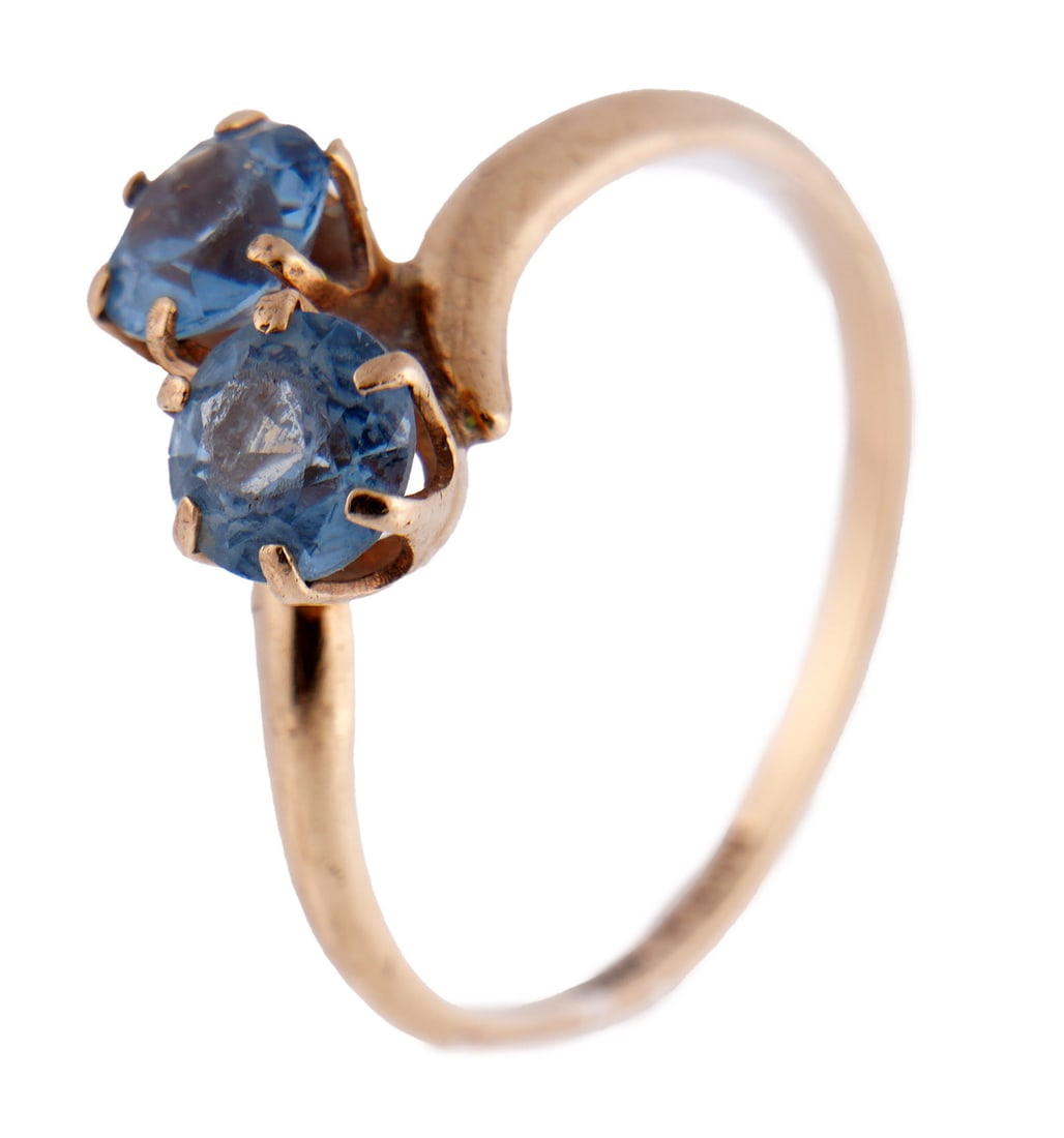 Antique Topaz Toi et Moi PSCO 10K Yellow Gold Ring: Antique topaz "Toi et Moi" ring 10K yellow gold. Made by the Plainville stock co. ( P.S.C.O) between 1896 - 1968. Stamped " 10K-PSCO." Two round cut topaz measure 5.03 mm in diameter. Size 7. This lot