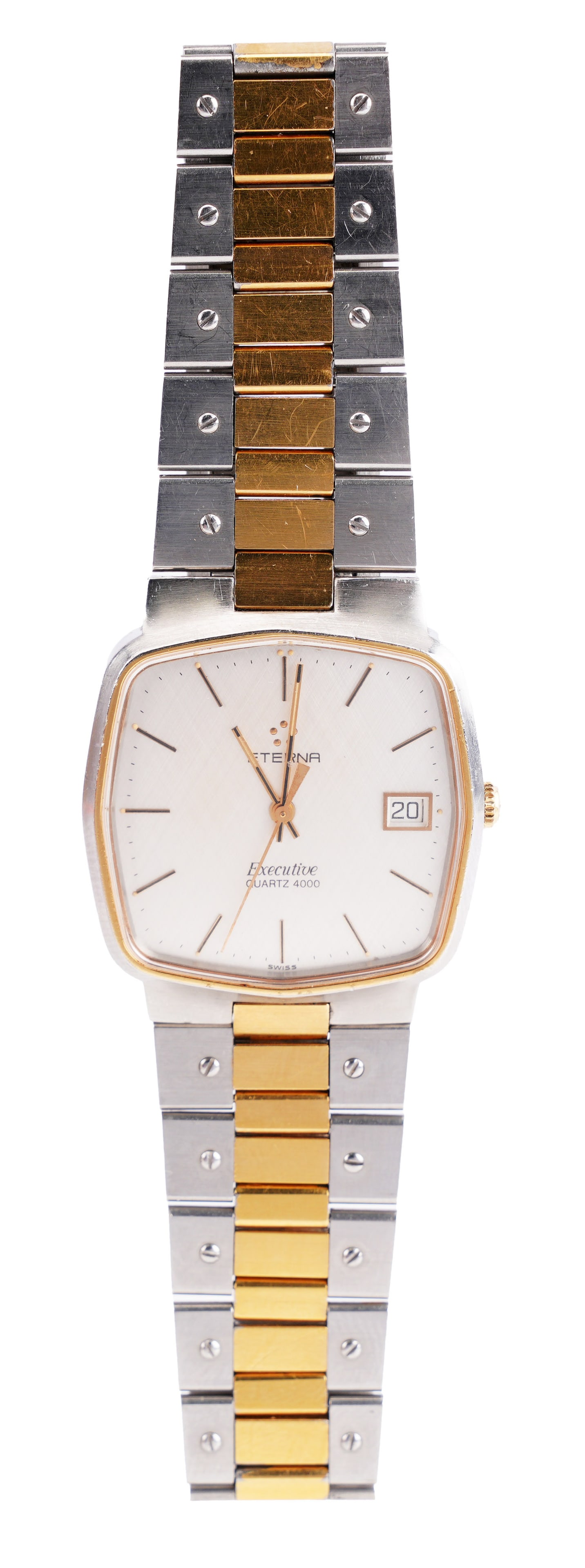 Eterna Executive Quartz Wristwatch: A late 20th-century Swiss-made quartz dress wristwatch manufactured by Eterna, from the 'Executive' collection. The watch features a classic retro-styled 'TV' or cushion-shaped bezel seamlessly integr