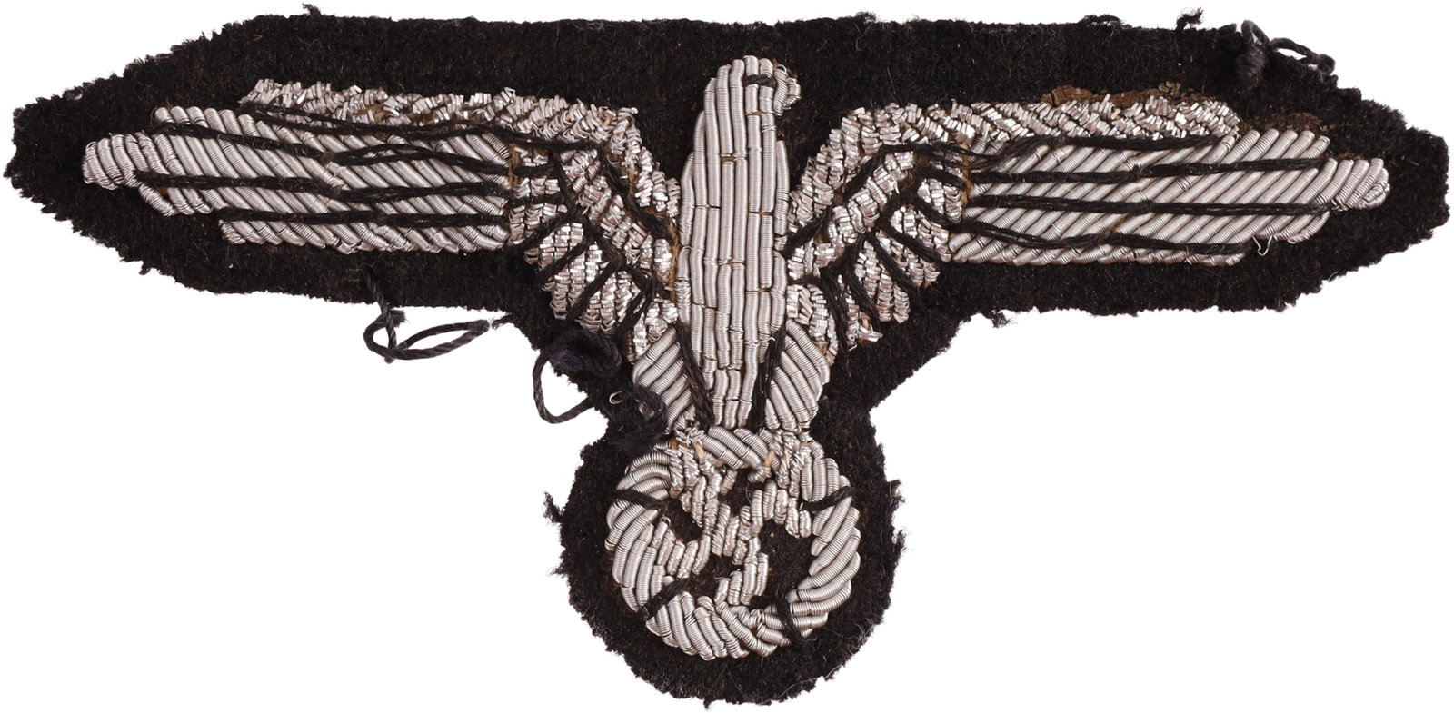 WWII SS Embroidered Uniform Sleeve Eagle: WWII German Reich SS aluminum bullion wire embroidered sleeve eagle. It measures 3 1/2 inches. Non-fluorescing. Unauthenticated, sold as is. This lot has a reserve.