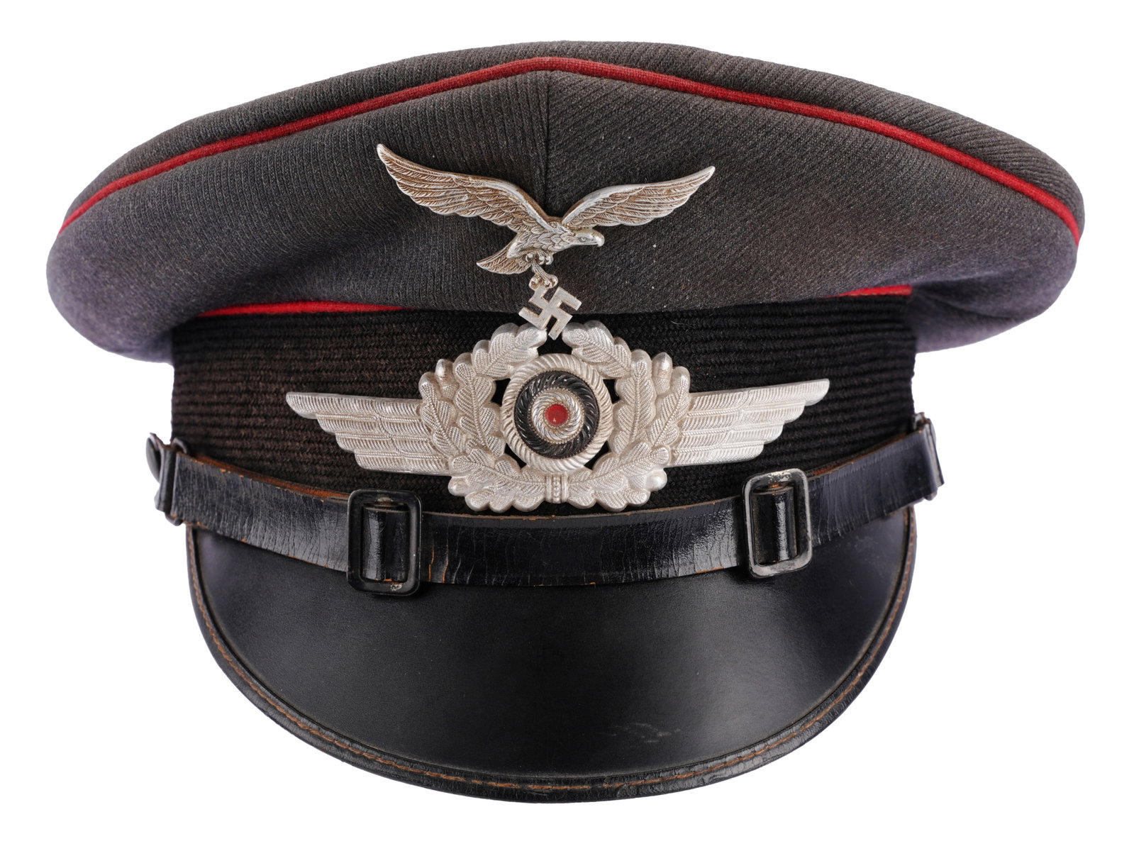Luftwaffe Flak EM/Officer Visor WWII German: Blue grey visor with aluminum Reichsadler and cockade. Eagle appears to be marked F. P.CHL. Liner is brown linen with leather headband. Previous maker mark is faded. Interior diameter measures 6 1/2 i