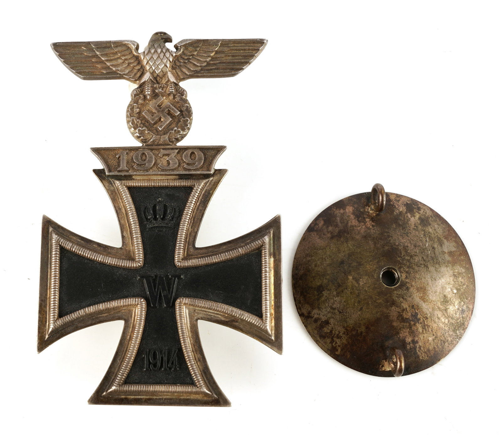 WWI German Iron Cross First Class W 1939 Spange: Multi-piece silvered frame with magnetic iron core. Non-hinge type spange. Screwback pin. No maker's marks. Measures 2 7/8 inches. This lot has a reserve.