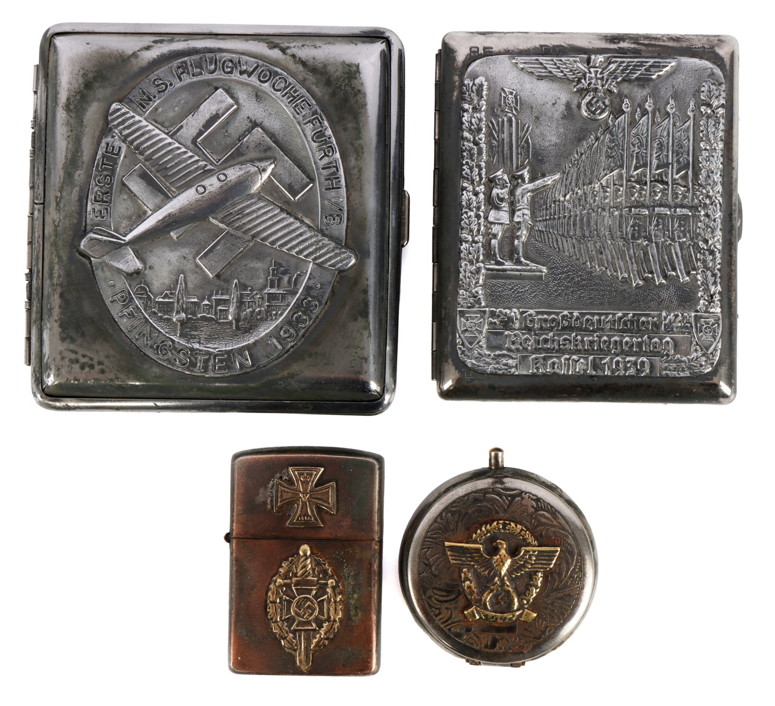 Third Reich Personal Effects Lot of 4 WWII: Four (4) personal effects bearing the symbolism and imagery of the German Third Reich. 1) Zippo-style lighter with Iron Cross design. 2) Cigarette case for Reichskriegertag 1939. 3) NSFK 1939