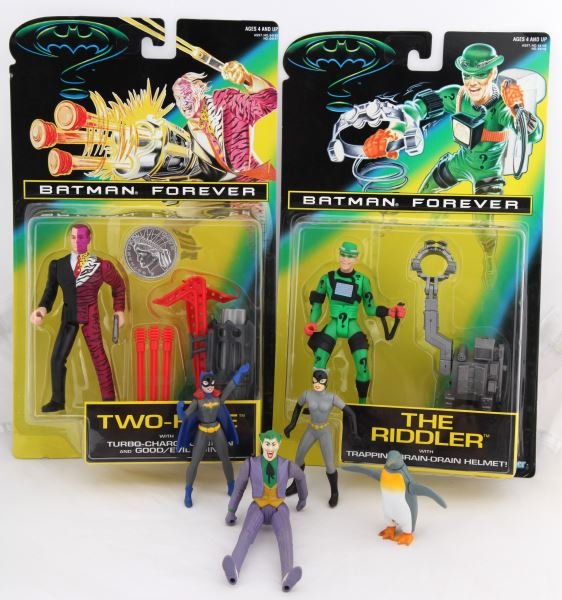 GROUP OF BATMAN ACTION FIGURES SOME IN BOX: Grouping includes The Riddler & Two-Face in their original boxes. Group also includes four loose action figures including The Joker, Catwoman, Batgirl, and a Penguin (not to be mistaken with The Pengu