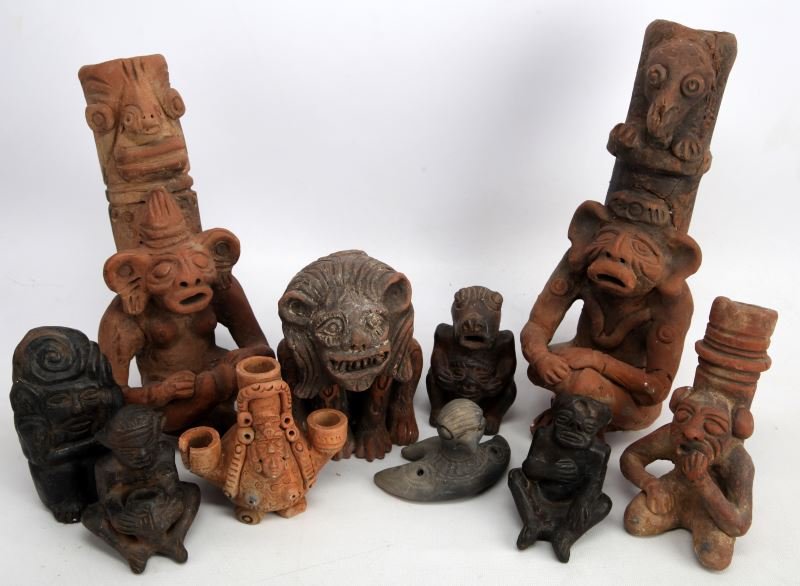 NATIVE MAYAN INDIAN FIGURAL POTTERY TEN PIECE: Native Mayan Indian figural pottery lot of ten. circa 1955. Includes totem figures with Jaguar and Mayan Gods, unfired clay candleholders (one broken), and some black clay figures depicting men and an