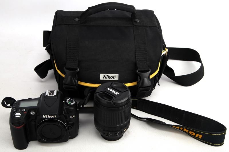 NIKON D90 DIGITAL CAMERA WITH VR LENS 18-105MM: Nikon d90 digital camera comes with Nikon DX af-s Nikkor 18-105mm lens, lens bag, standard video cables, instruction manual, install disc software, and a case which houses camera and accessories. Used