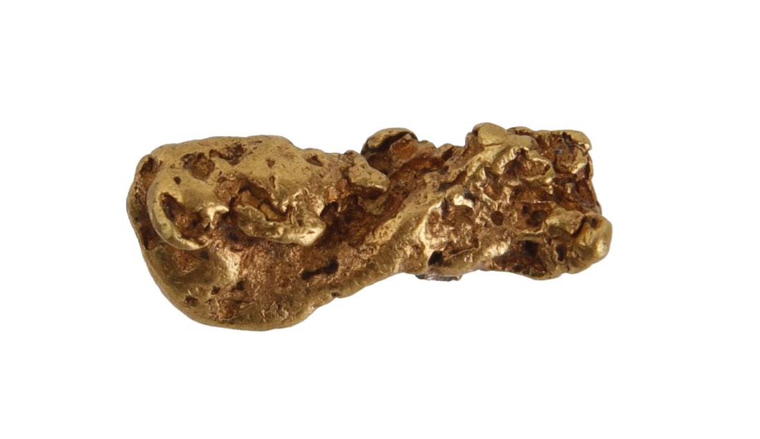 22K Gold Nugget: Weighs 2.1 grams. Guaranteed gold. | This lot has a reserve.