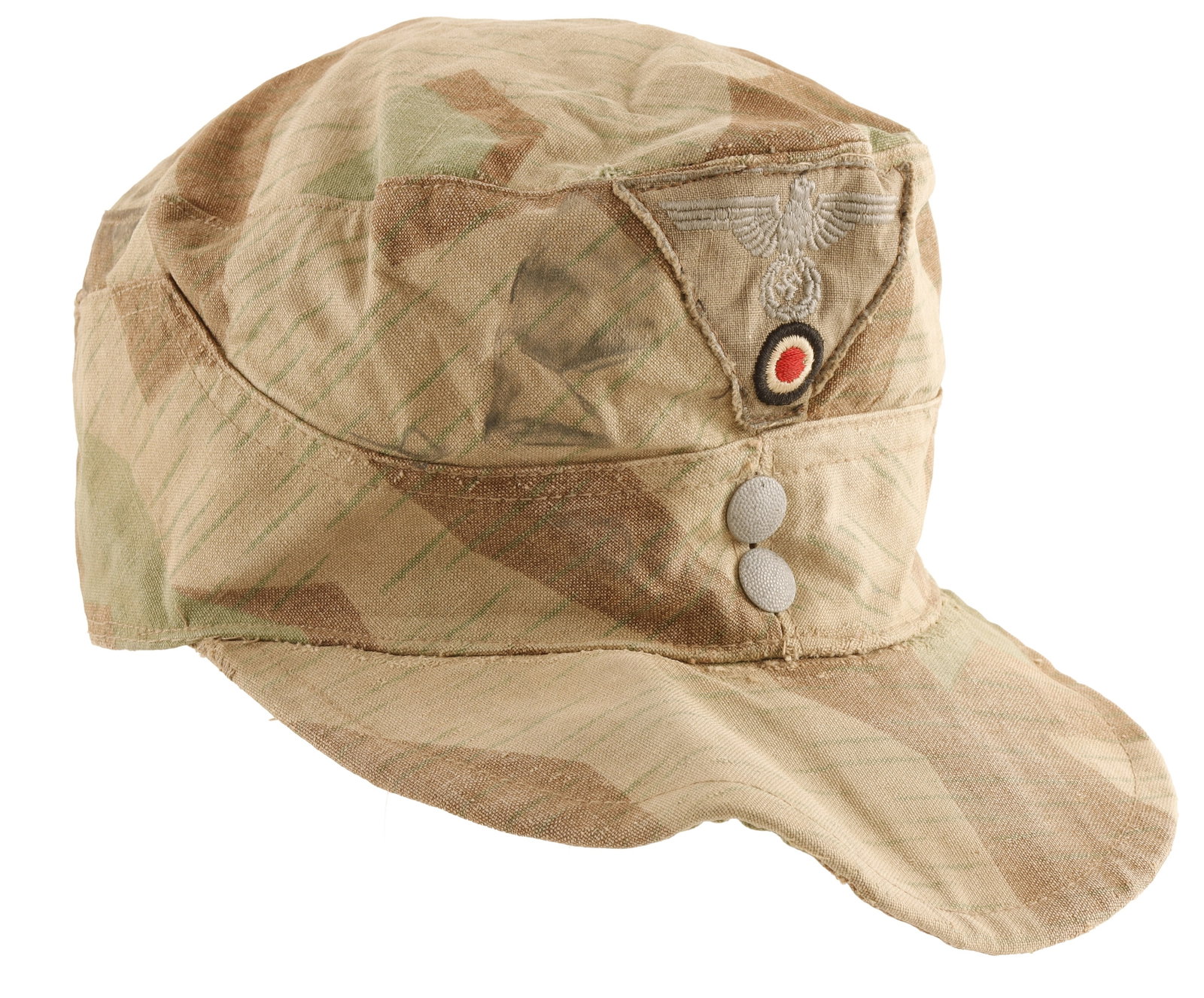 Gebirgsjager Mountain Troop Cap WWII German: Gebirgsjager Mountain Troop Field Cap. Embroidered eagle and cockade patch on camo cap. Zinc pebbled buttons. Modern historical example.
