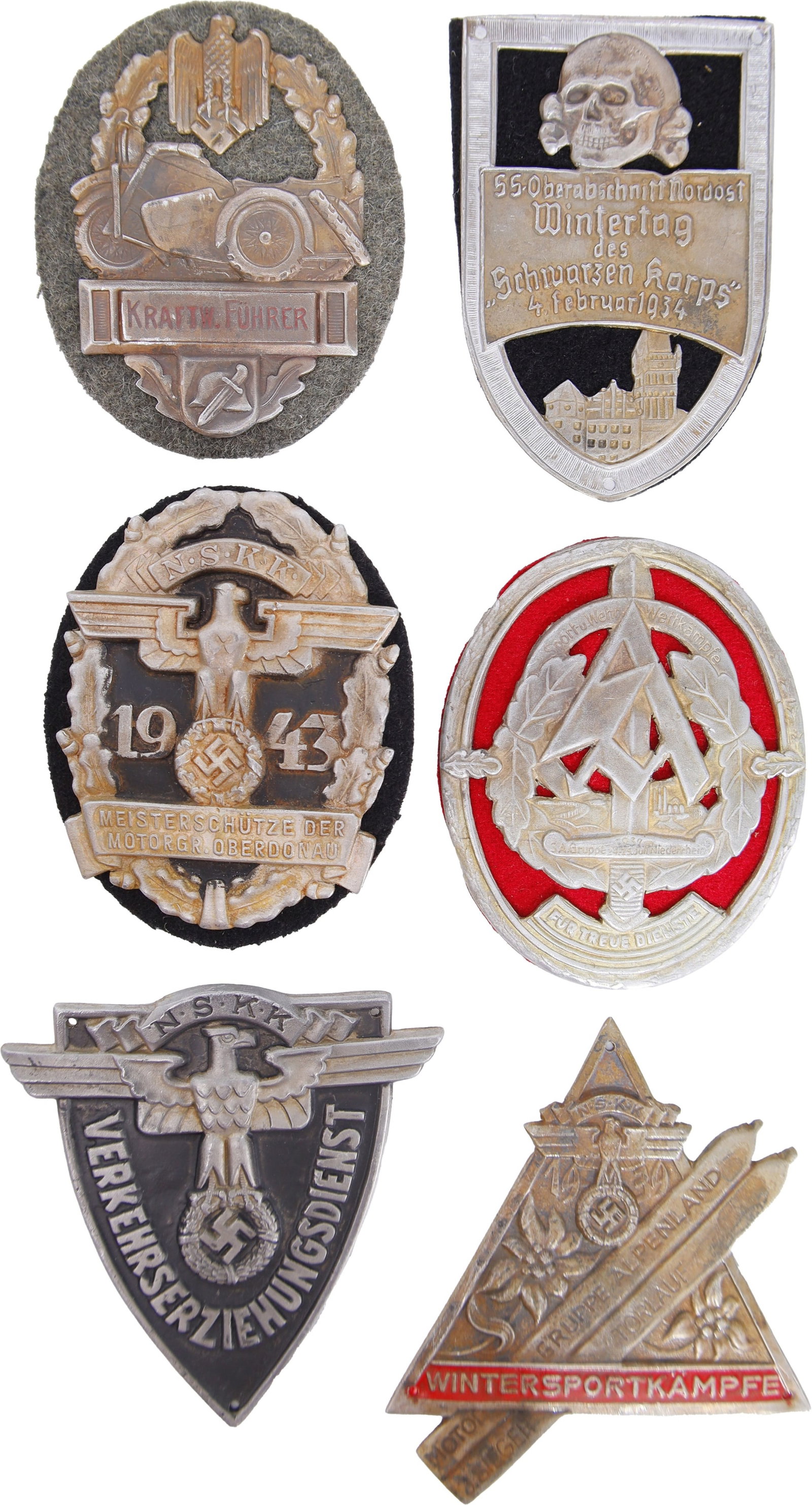WWII German Military Badges Lot of 11: One NSKK Motorcorp badge; black background, gold colored laurel on three sides, Eagle holding swastika and inscription under. Date of 1943 across middle. One NSKK Kraftfuhrer; gold depiction of an aut
