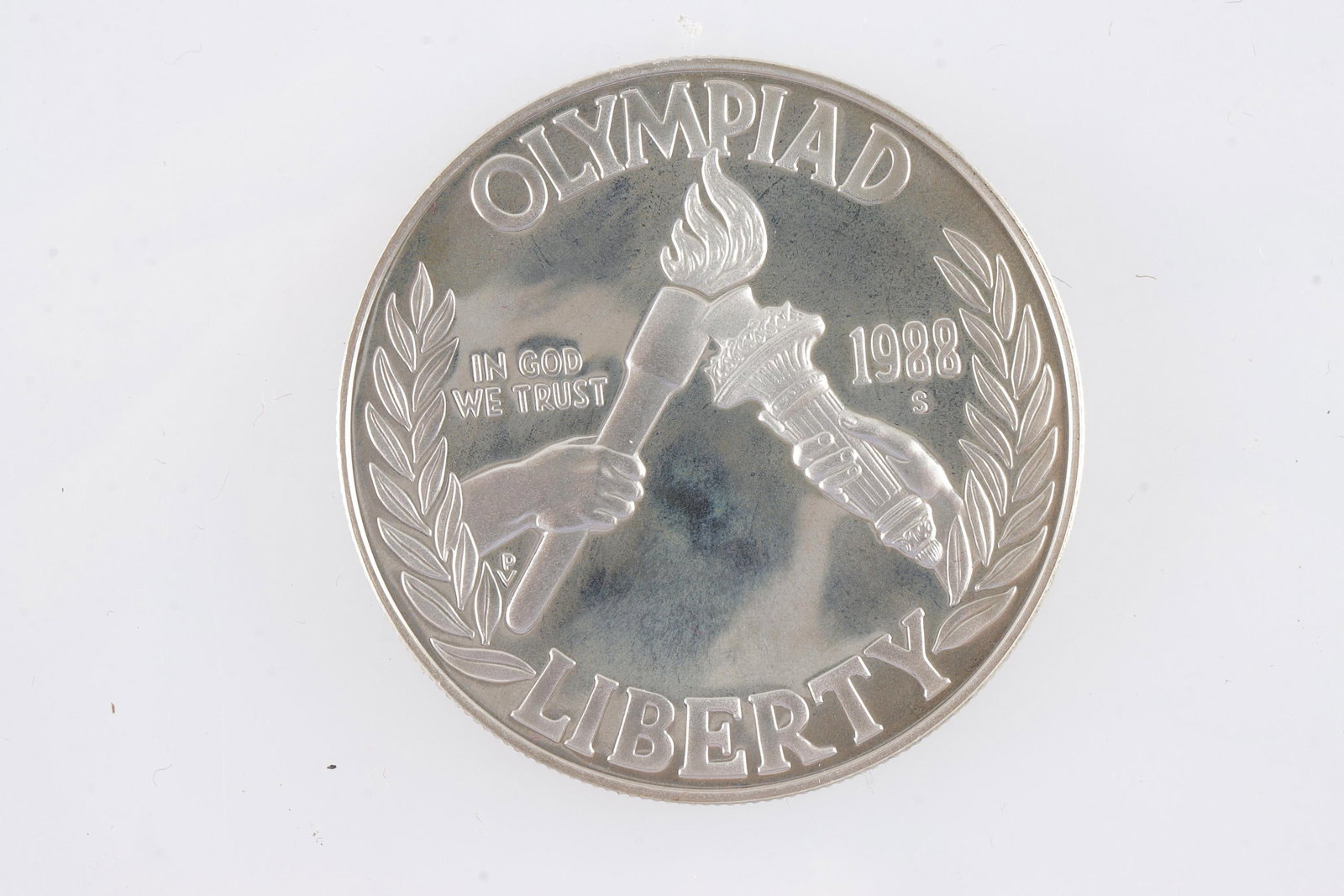 1988 US Mint Olympic Silver Dollar Coin: From the mint. Comes in the box. Metal: Silver Country of Origin: USA Year Minted: 1988