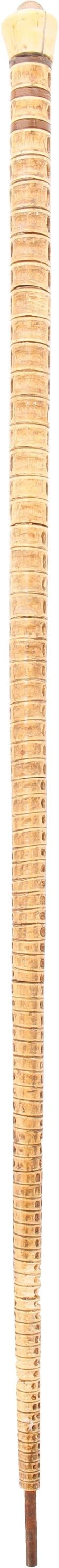 Whaler Shark Cartilage Vertebrae Stick Ivory Knob: A walking stick made from shark cartilage vertebrae, with an antique walrus ivory knob. Creation of these items was normally carried out by whalers as a form of folk art. 34.5 inches. No international