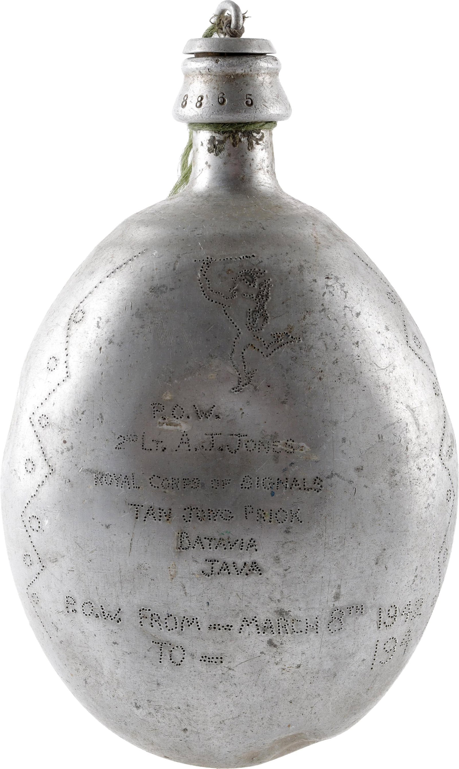 KNIL Canteen With Pow Inscription WWII Batavia: A KNIL (Royal Netherlands East Indies Army) canteen, bearing an etching from a British prisoner of war. KNIL canteens were adopted for use by the Japanese after the fall of Batavia, and subsequently u