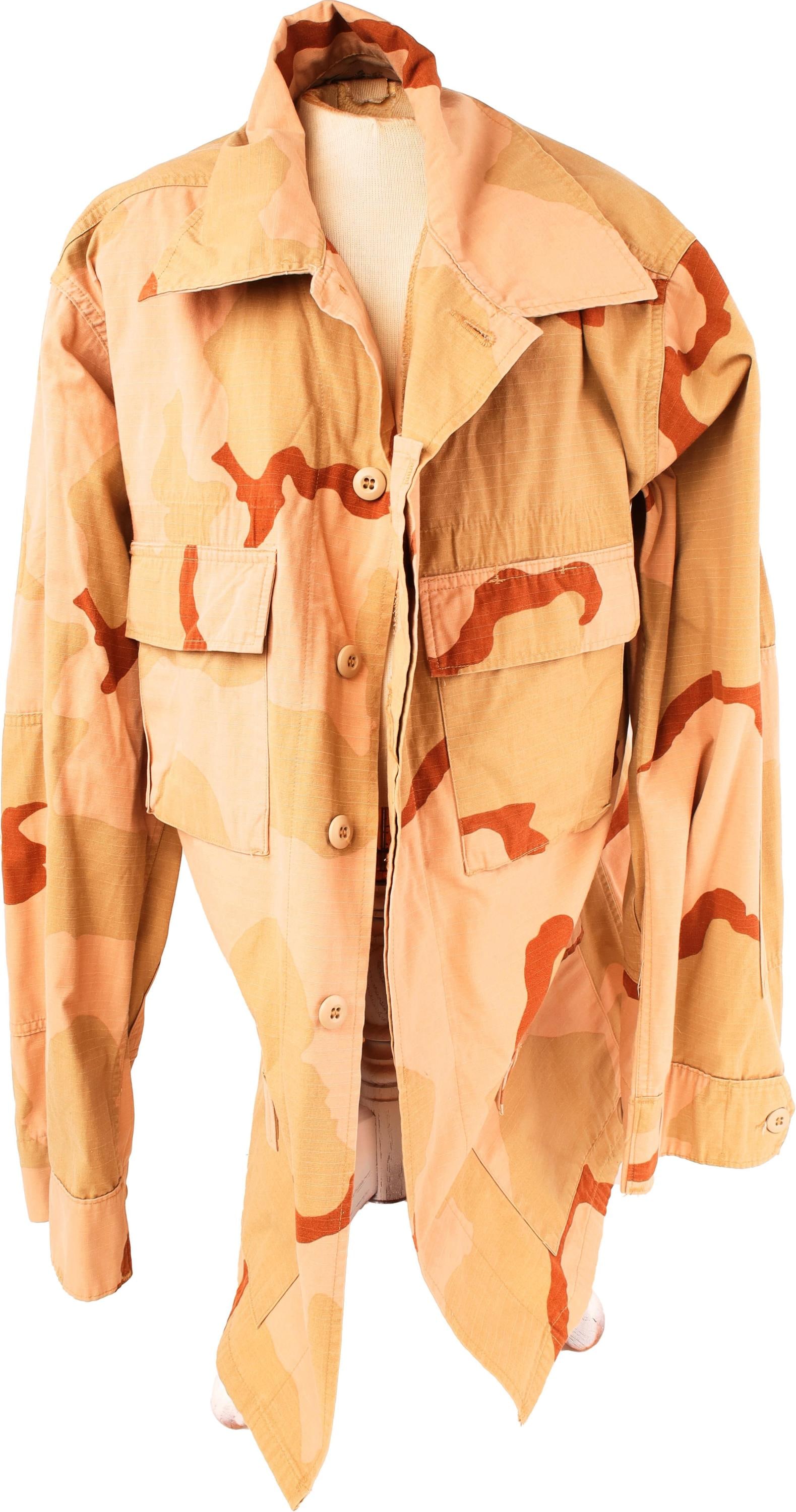Desert Camouflage Combat Jacket US 1996: A desert camo combat jacket for the US Military, circa 1996. Stock #Spo100-96-D-CA66. Size medium-long.