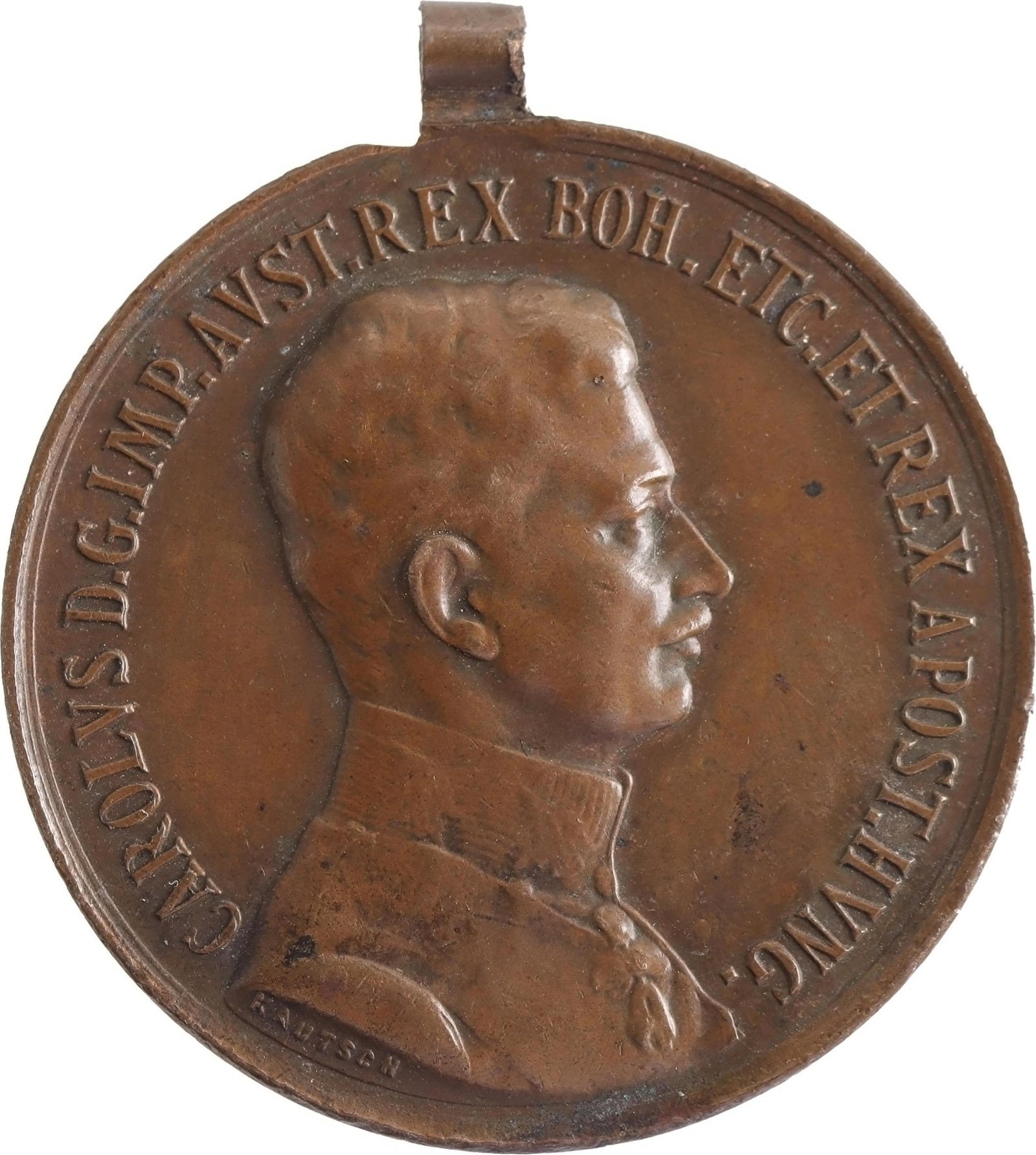 WWI Bronze Austro-Hungarian Combat Medal Kautsch: A bronze WWI-era Austro-Hungarian combat medal, without ribbon or suspender. Obverse side depicts Emperor Joseph II in profile, with designer's mark 'KAUTSCH' and inscription reading, "CAROLUS D.G. IM