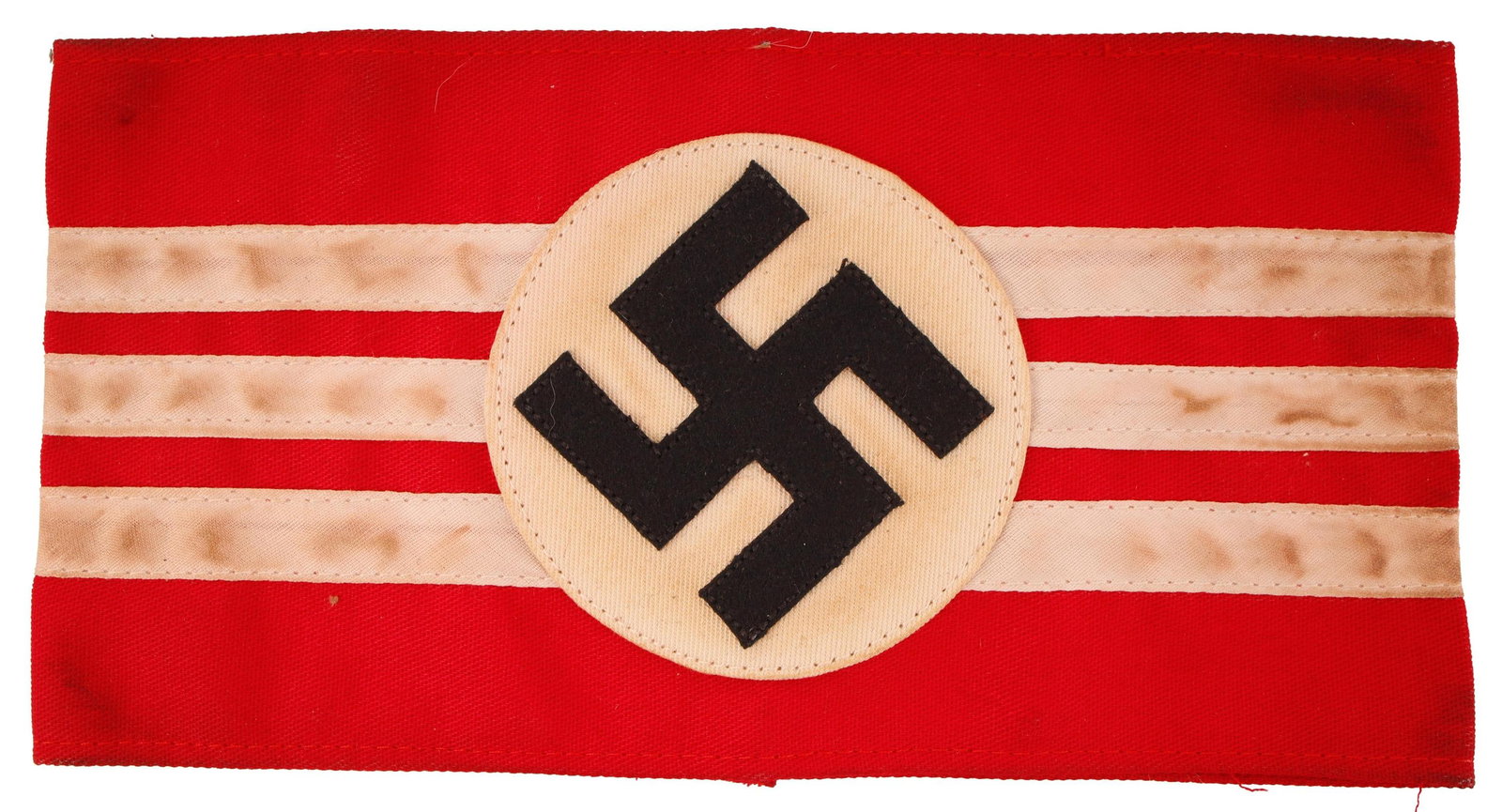 WWII German Political Leader Armband: Amtsleiter Political Leader armband. Red fabric with a white and black swastika emblem patch; patch is centered over three white stripes which encircle the armband. Measures approximately 8 3/4" x 4 1