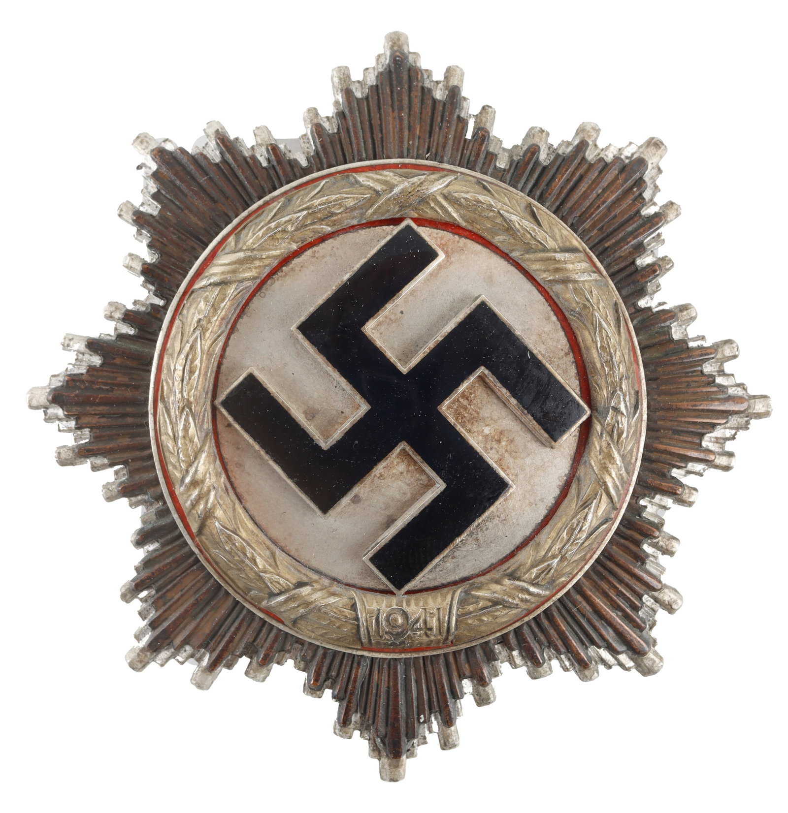 Cased German Cross in Silver WWII Third Reich: German Cross in silver with rare 16 rivet construction. Nice patina. Unmarked but has typical Klein or Zimmermann pinback construction. In smaller first issue case. Measures 2-1/2 inches. | This lot h