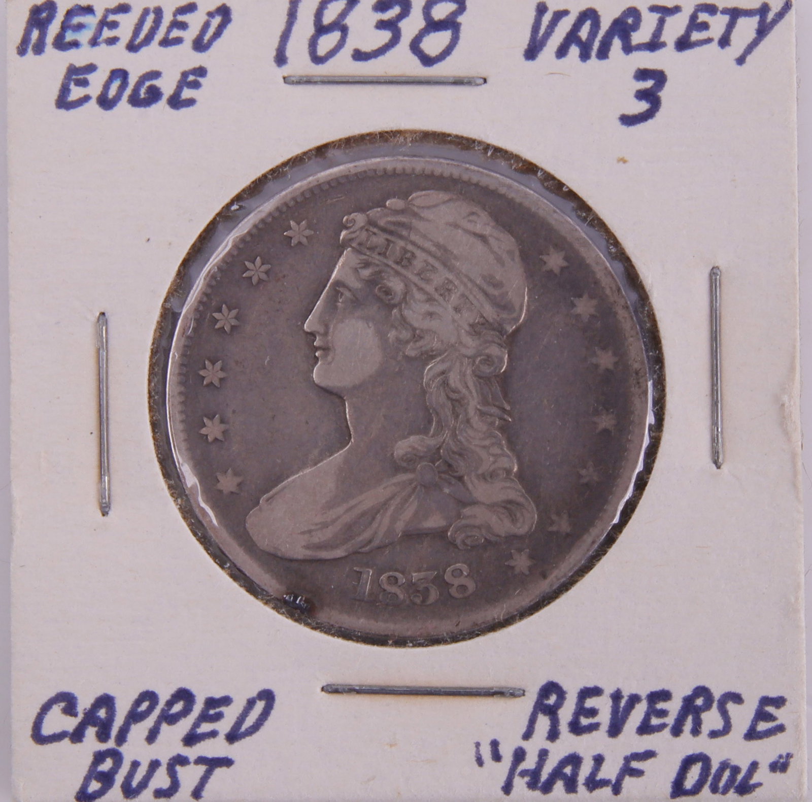 US 1838 Type 3 Reeded Edge Capped Bust Half Dollar: United States 1838 Capped Bust silver half dollar. Type 3, Reeded Edge variety with "HALF DOL." denomination designation on the reverse. Metal: Silver Country of Origin: US Year Minted: 1838.