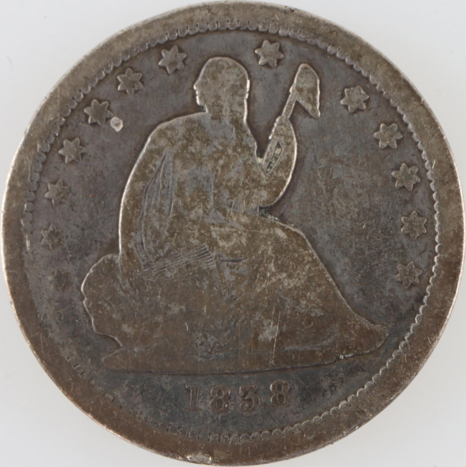 1838 Seated Liberty Silver Quarter: US 1838 Seated Liberty silver quarter 25c coin. first year of the long-running Liberty Seated twenty-five cent series. Engraved by Christian Gobrecht, the obverse shows a classic representation of Lad