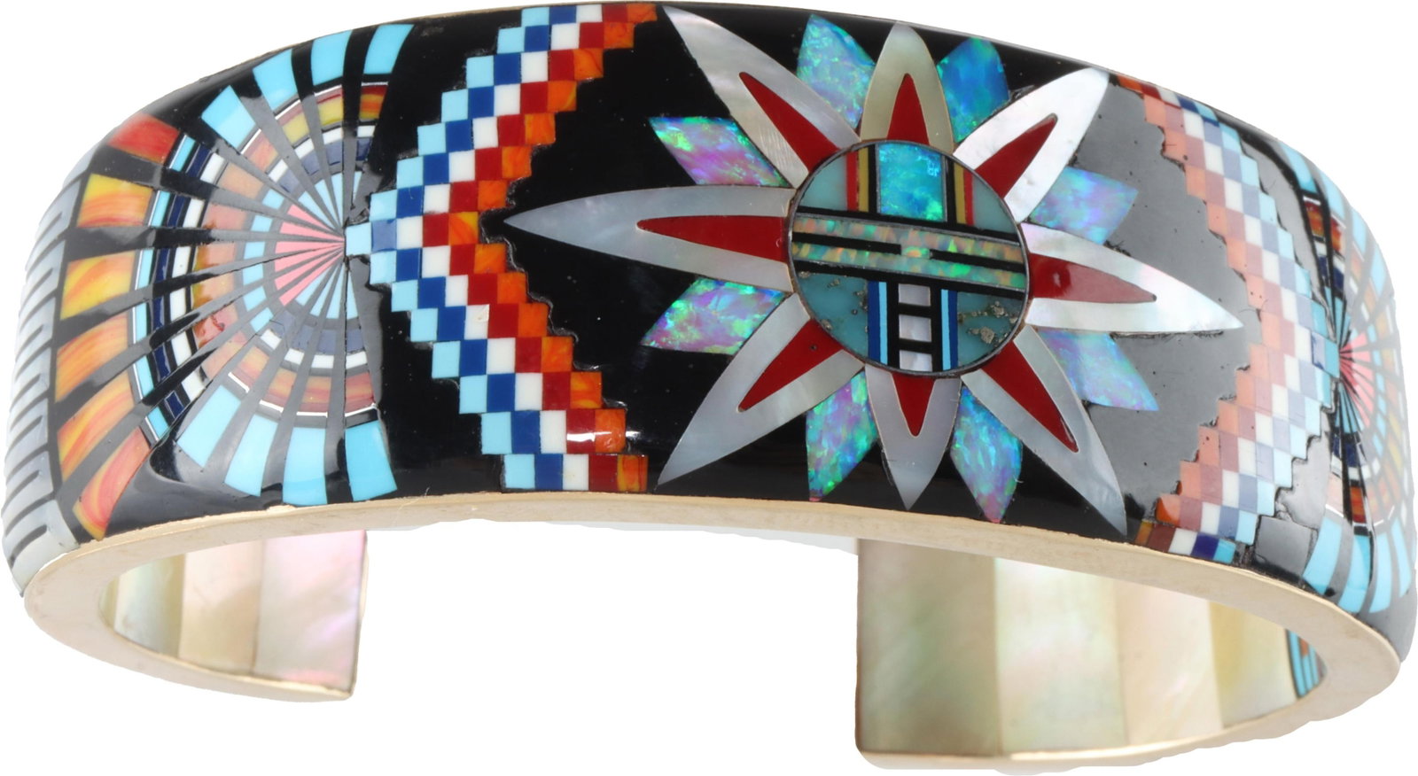 Zuni Inspired Space Cuff Glodove 14K Gold: Ronnie and Ramil Glodove artisan geometric pattern cuff after Zuni artists. Framework stamped 14K yellow gold and hand-signed 'RRG'. This design features a Zuni inspired roundel, re-imagined to resemb