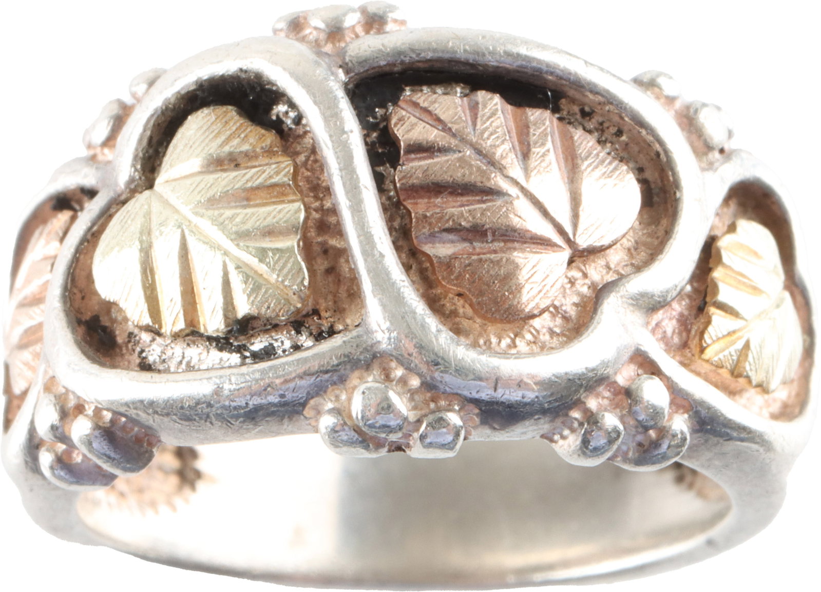 Sterling Silver Ring Black Hills Gold Coleman Co.: A vintage, stamped Coleman Company ring, size 6. Marked Sterling silver ring with black hills gold accents. Weighs 6.7 grams. | This lot has a reserve.
