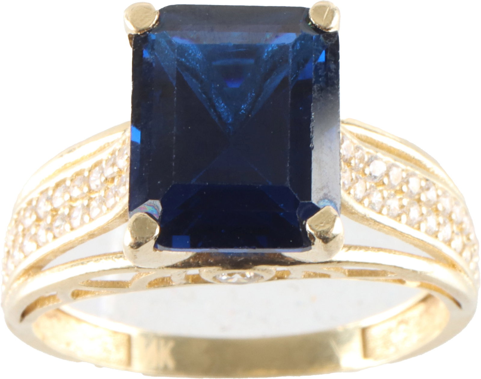 Blue Spinel Gold 14K Ring Size 7.5: A gold ring featuring a lattice-set dark blue spinel (measuring approximately 10 mm x 8mm x 5mm). Marked '14K' on inside of band. Ring size 7.5; weighs 17.5 carats/3.5 grams. | This lot has a reserve.