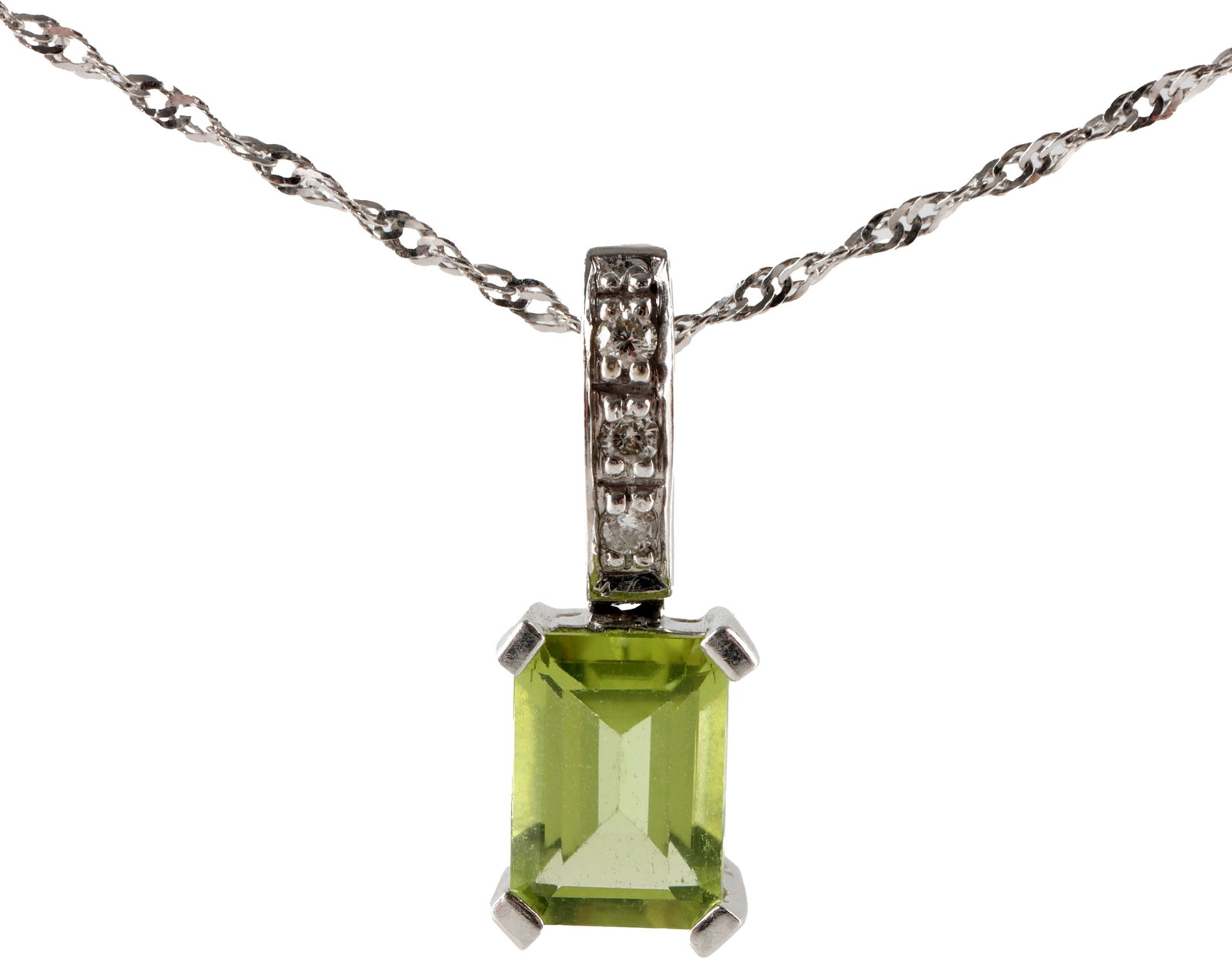 Peridot Diamond 14K White Gold Necklace: Peridot measures 6.9x4.9 millimeters. Diamonds are single point. Reverse of pendant and clasp are stamped "14K". Necklace measures 18 inches long. | This lot has a reserve.