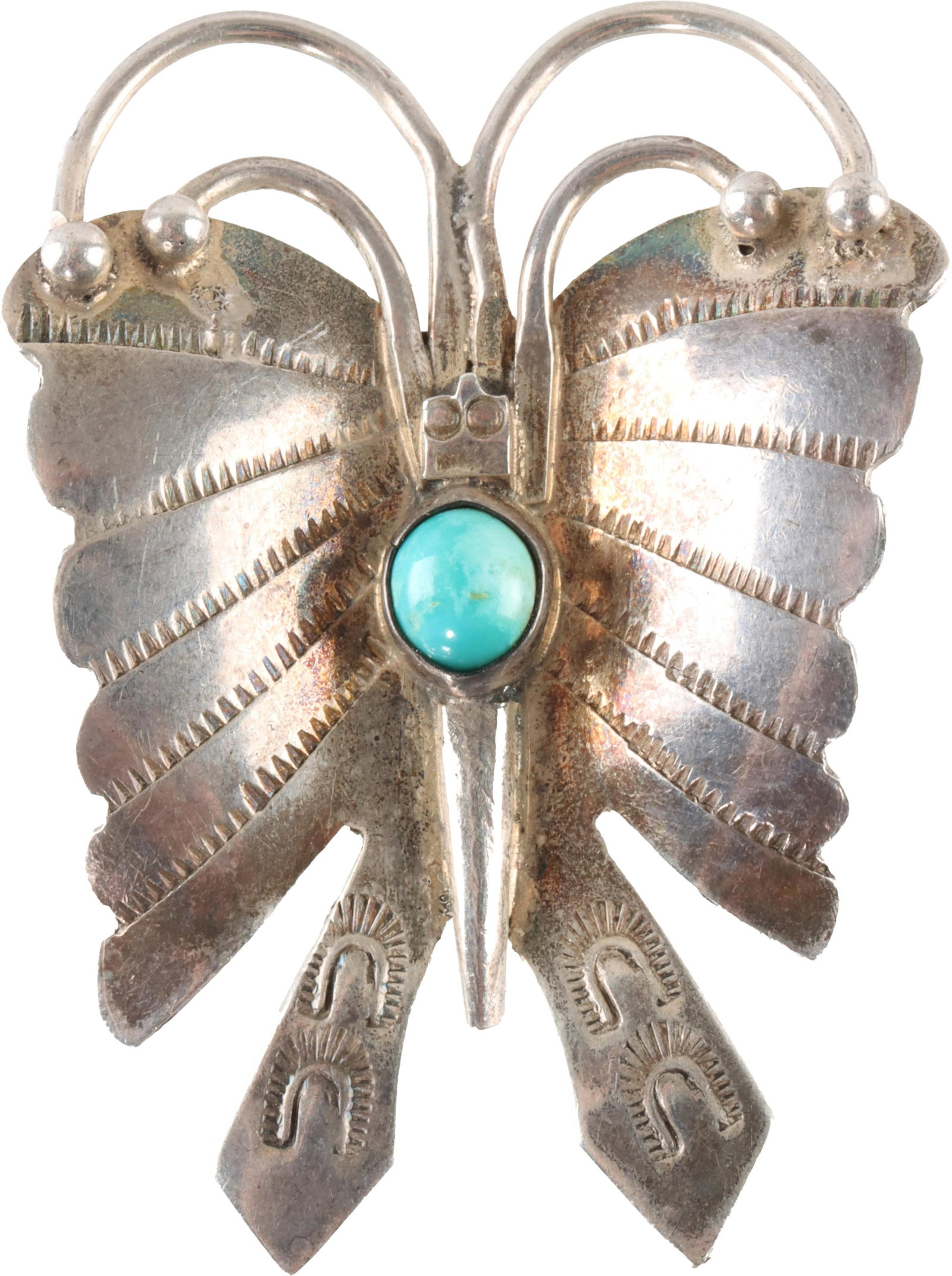 Vintage Sterling Silver Turquoise Butterfly Pin: A vintage Navajo-style silver butterfly pin with a hand-made safety catch and a set turquoise stone. Features hand-etched details. Not marked silver, but tests appropriately. Measures approximately 1 