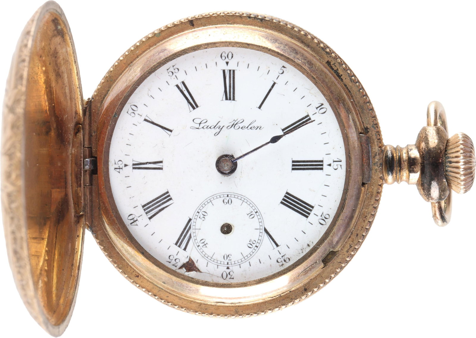 Lady Revlon Gold Fill Pocket Watch: Lady Revlon pocket watch. Produced in Hong Kong between 1970-1990. Gold case with decorative etchings, approximately 1 inch in diameter. White face with roman numerals in black. Watch flips open by pr