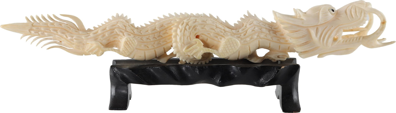 Mid Century Ivoroid Carved Chinese Dragon: It measures 10.5 inches. Comes on wooden base. Ivoroid construction or similar.
