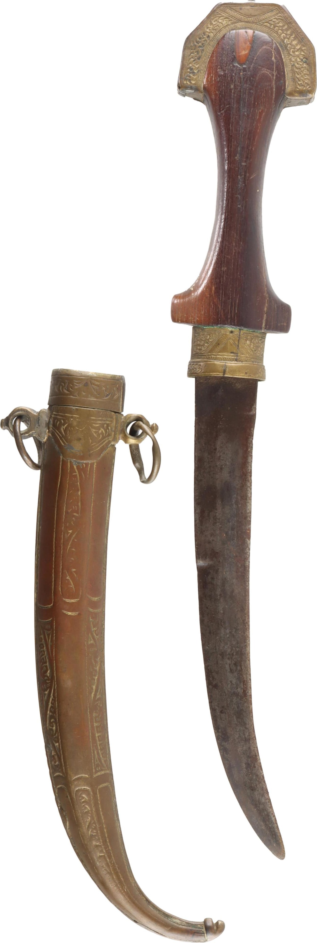 Koummya Dagger 19th C. North African Arab: Antique koummya or jambiya curved dagger with scabbard, 19th century. Steel blade with decorated chased brass scabbard and fittings. Overall length 16.25 inches.