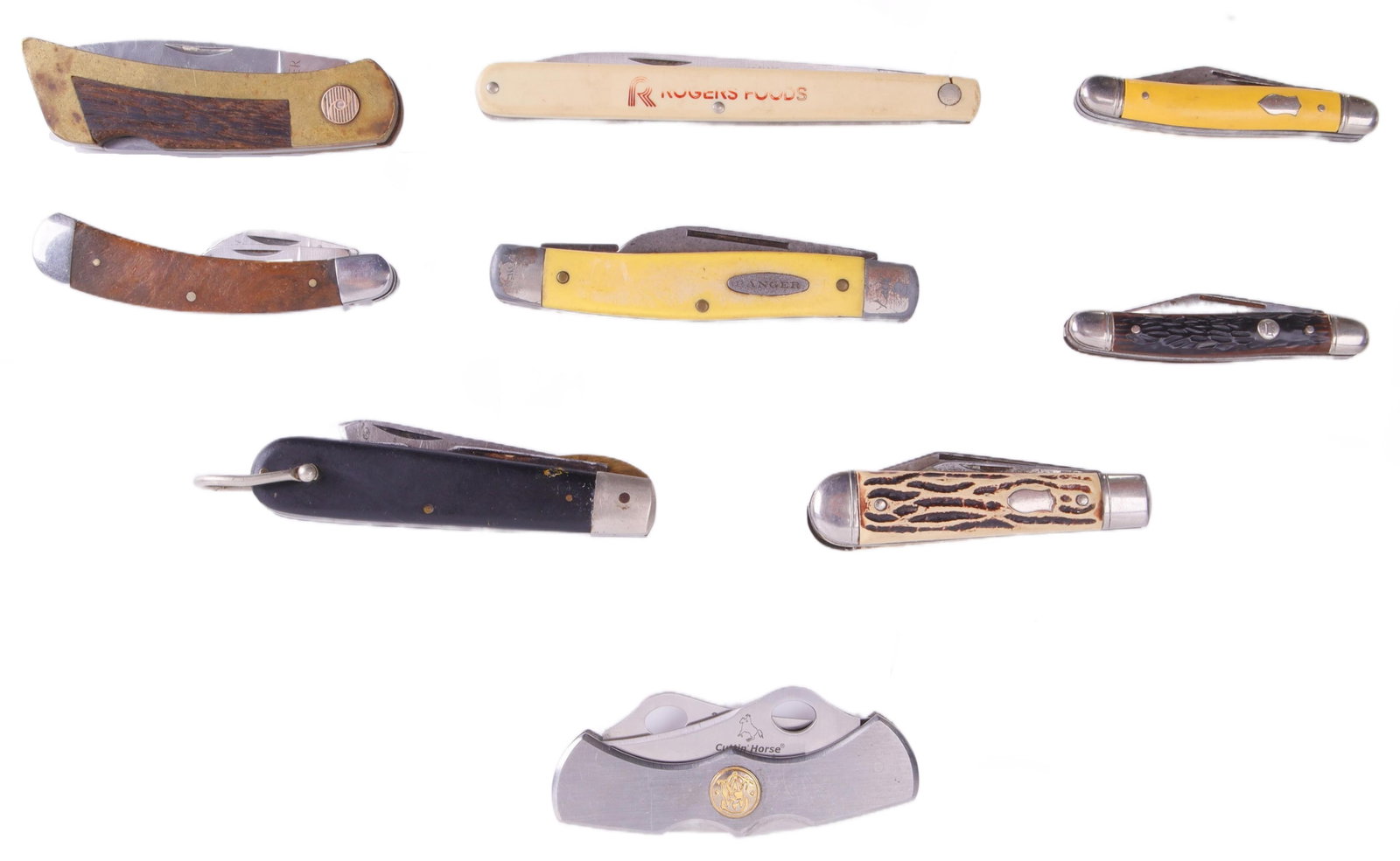 Lot of 9 Folding Knives Schrade and Gerber: Lot of nine (9) folding knives. The knives measure between 8-3/8 inches and 5-1/2 inches.