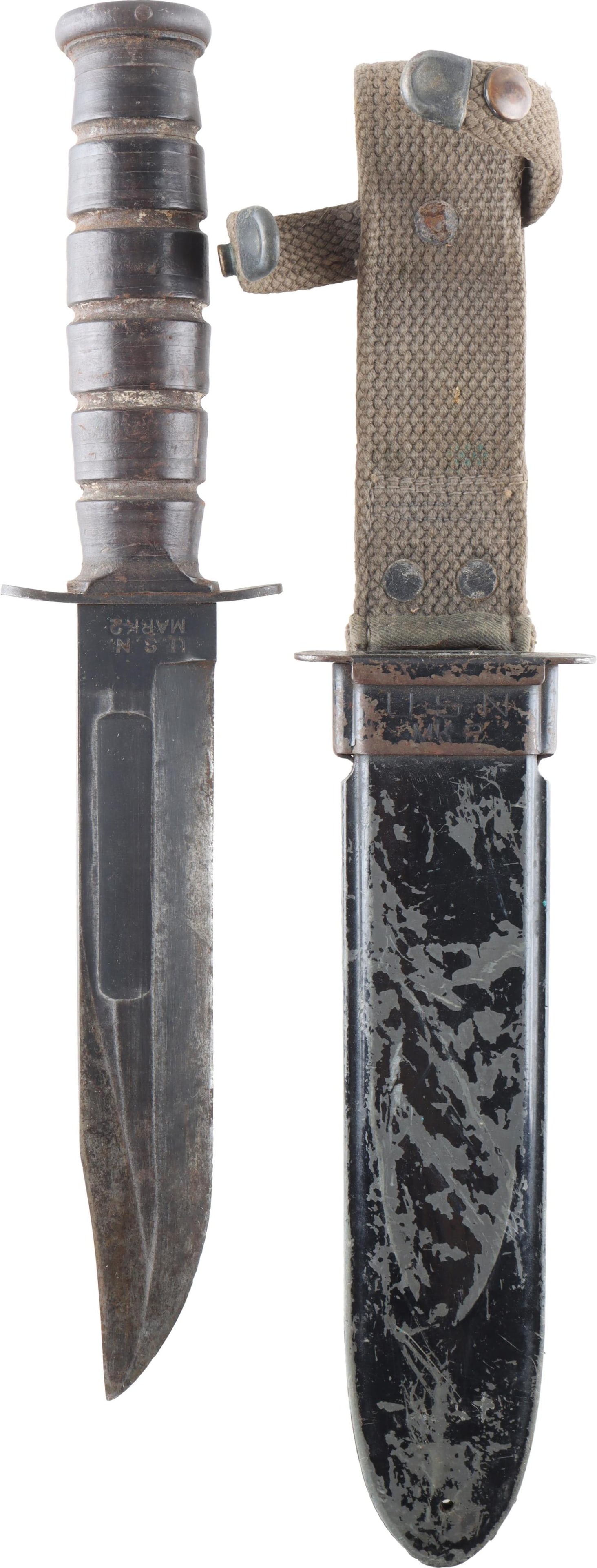 USN Mark 2 Fighting Knife w Scabbard Camillus NY: WWII USN Mark 2 combat knife with USN Mk 2 scabbard. Ricasso marked "Camillus, N.Y." and "U.S.N. Mark 2." Blade length 7 inches. Overall length 12 inches.