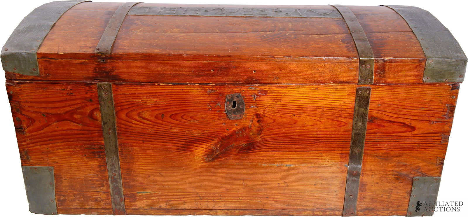 Antique Locker Trunk From Germany 19th Century: An antique locker trunk bearing the name of its owner, 'Andreas Heil,' on beaten metal. 33.5x16x15.5 inches.