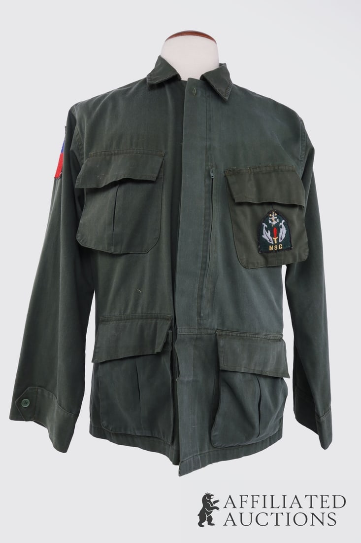 Philippines Special Forces Tropical Combat Jacket: Combat jacket of forest green twill, size L/XL. Right shoulder has Philippines national flag embroidered patch. Left breast has unknown embroidered patch with the text "NSG," an anchor over a red