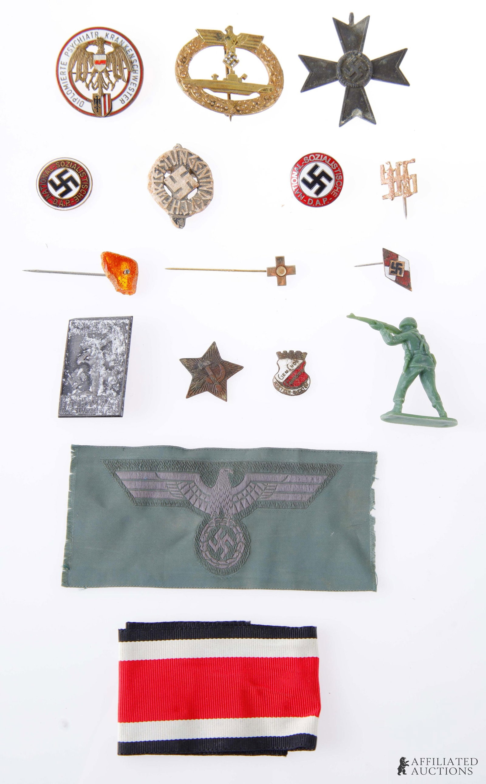 Assorted Vintage Military Medals and Pins Reich: An assortment of medals, pins, and other vintage memorabilia. Weighs three ounces.