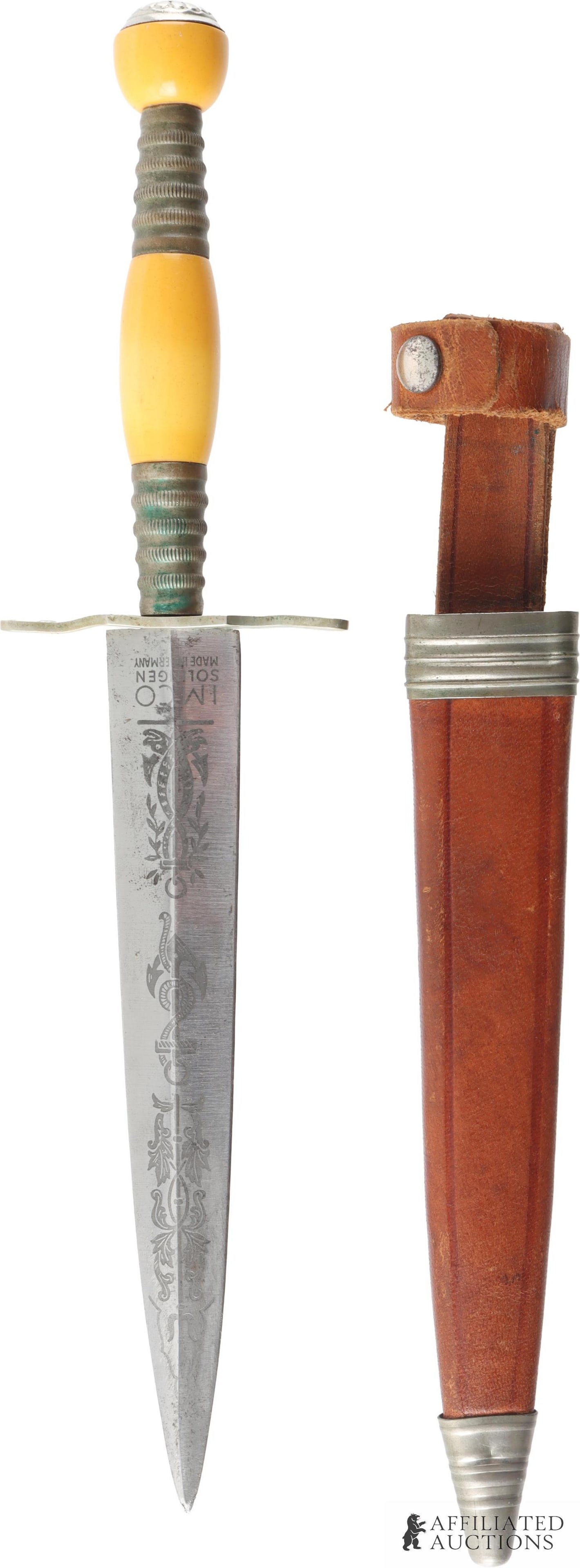 IMCO Solingen Naval Dirk With Scabbard: IMCO Solingen naval dirk. Total length is 11 inches. Blade length is 6.5 inches. The blade is decorated with a floral trident motif, and anchor and rope motif, and an anchor and dragon motif. Scabbard