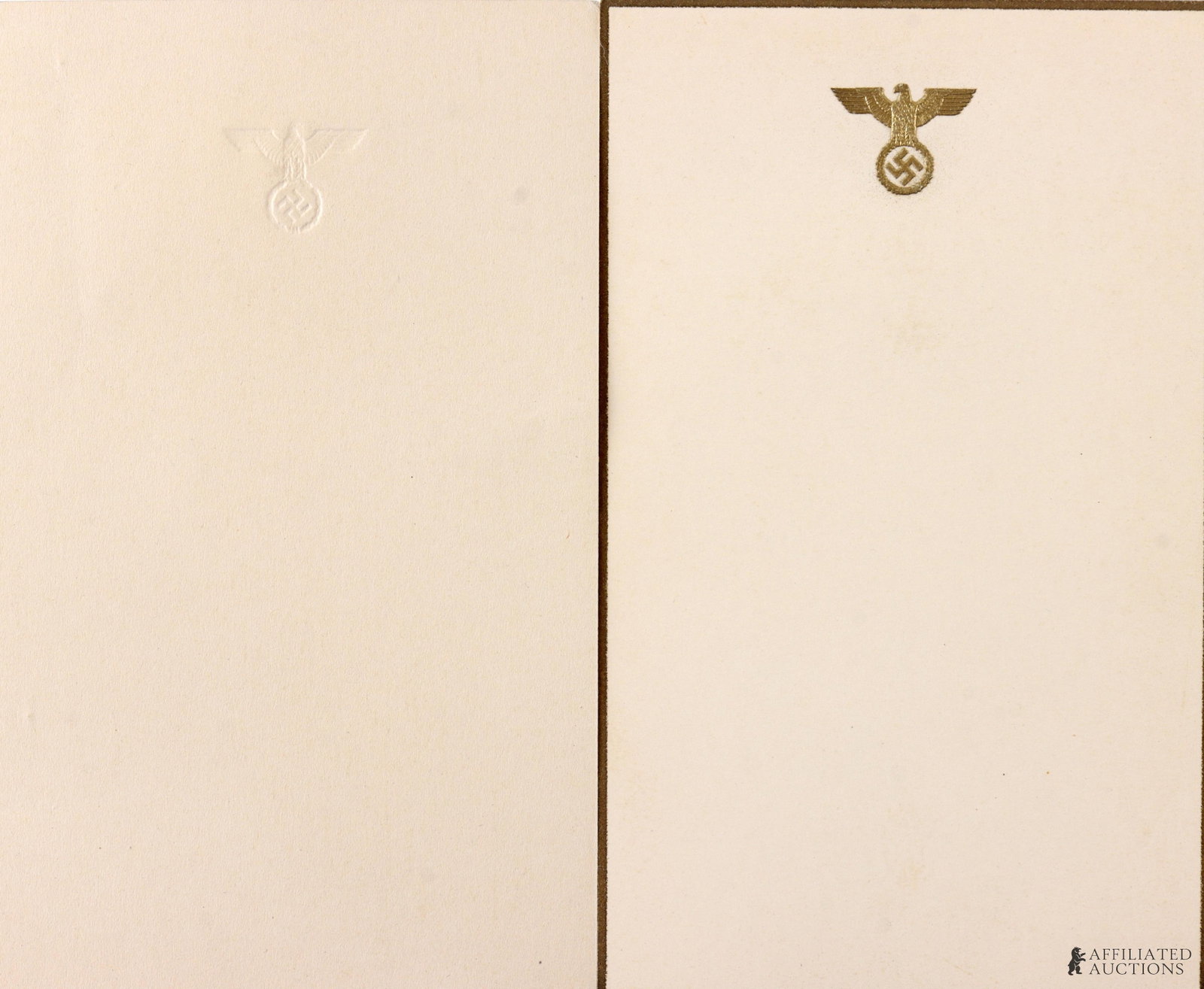 WWII German Stationery Paper Lot of 2 Third Reich: WWII-era German paper stock; one features a gold trim and a gold embossed national eagle, and the other is plain white stationery with an embossed national eagle. Both measure 4 3/8" x 7 1/8". Unauthe