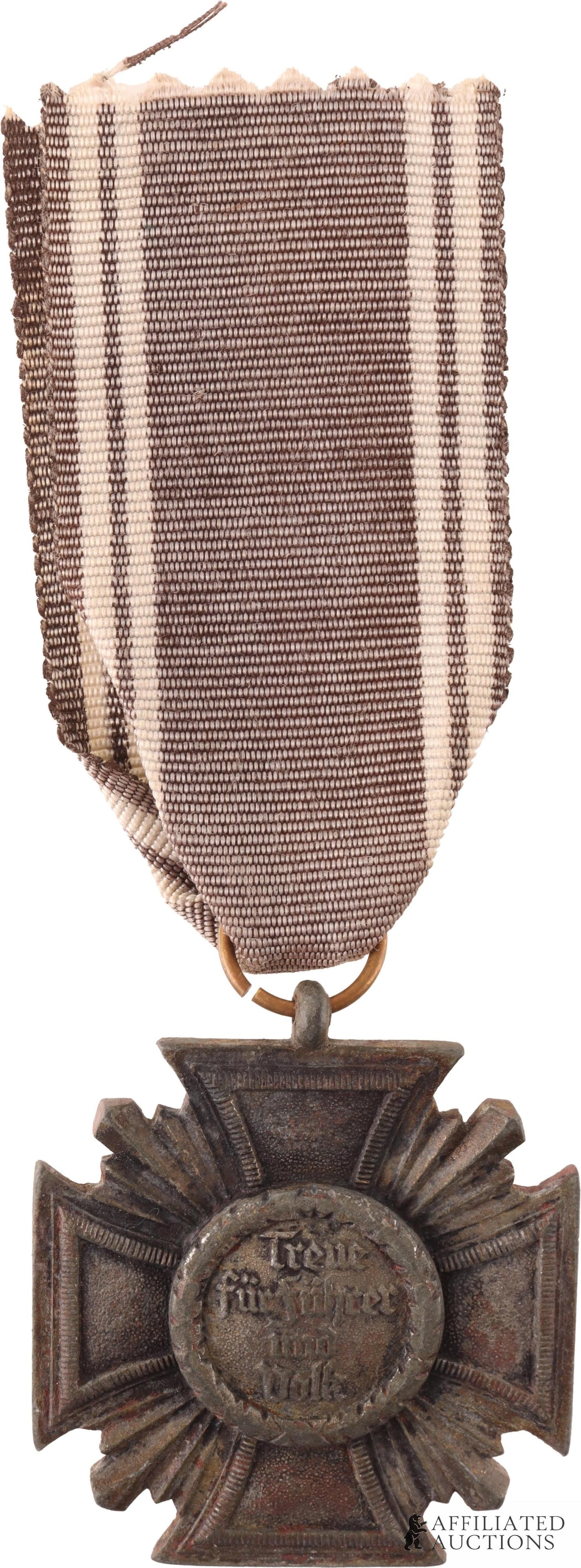 Bronze Nazi Party Long Service Award & Ribbon: Bronze Nazi Party Long Service Award & Ribbon. This is the Bronze award given for 10 years of service to the nazi party. On the obverse side of the badge there is reichsadler surrounded by a wreath.