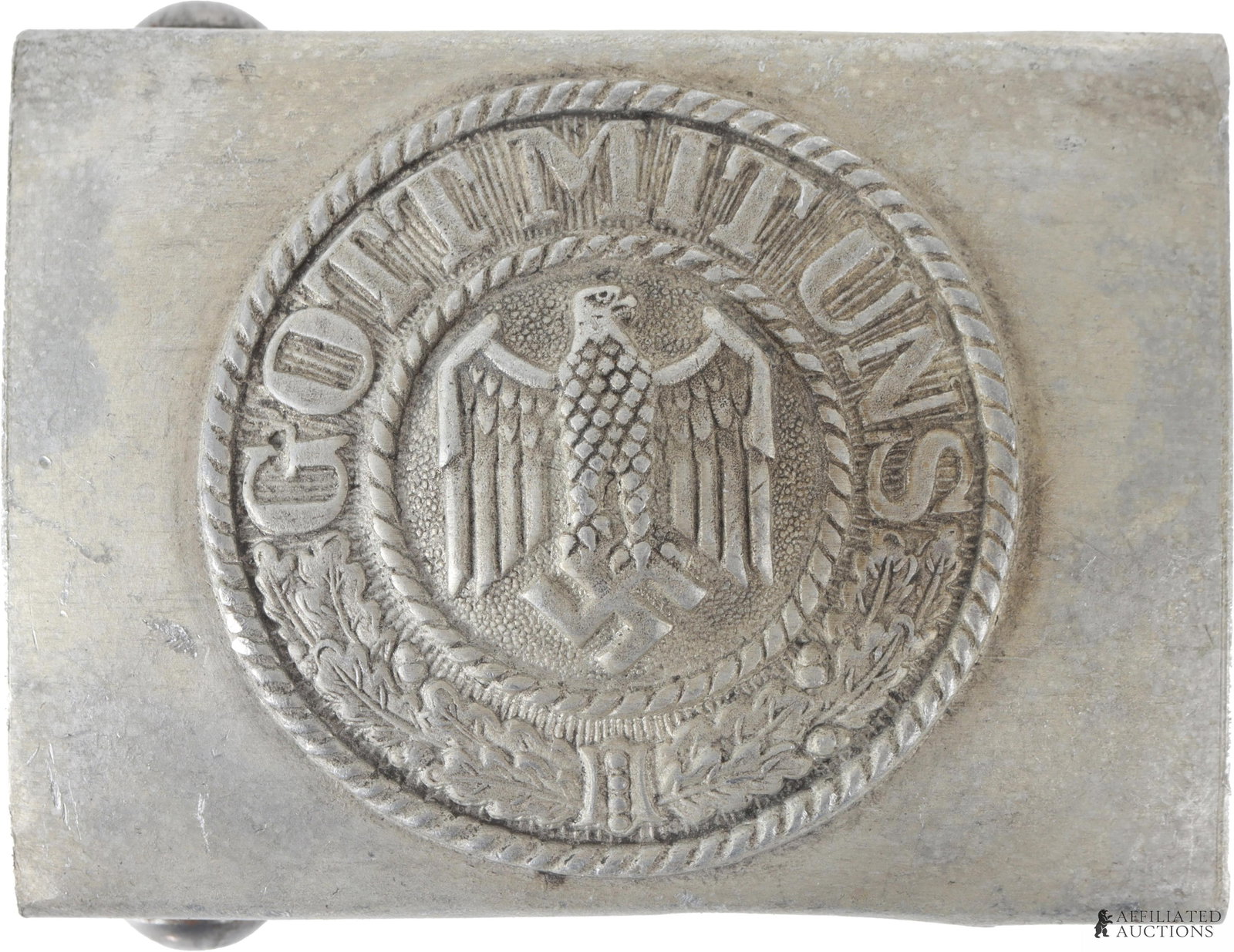 Gott Mit Uns Wehrmacht Belt Buckle WWII German: A belt buckle featuring the imagery of the Wehrmacht of the German Third Reich. Bears the motto "Gott mit Uns" and displays an eagle clutching a swastika.