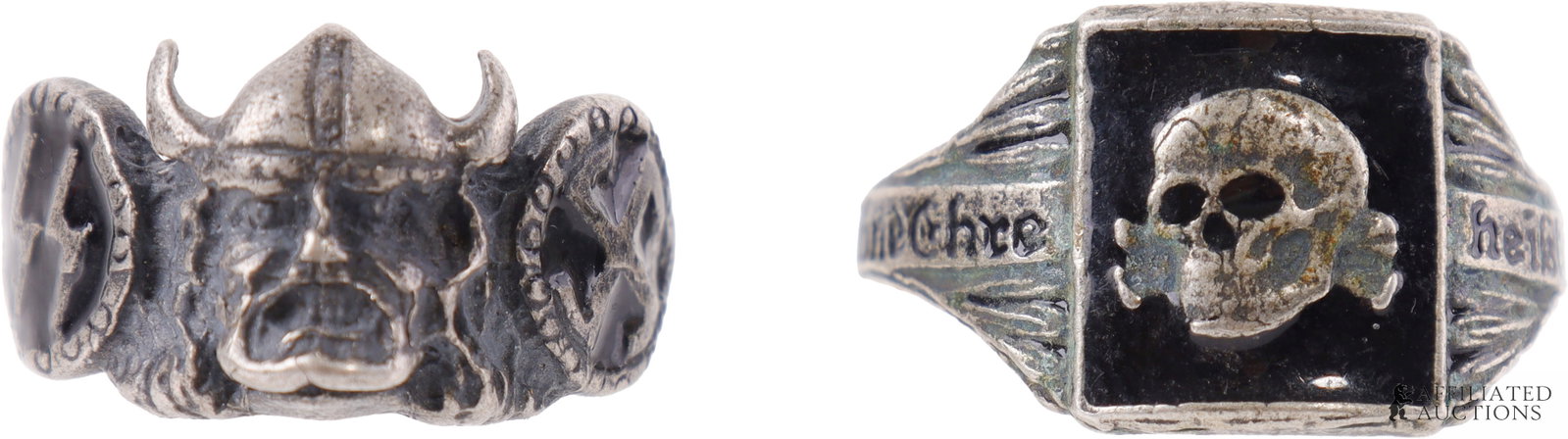 Wiking & totenkopf Rings WWII German Lot of 2: A set of two (2) silver rings bearing the imagery of the Waffen-SS of the German Third Reich.1) Wiking heads with swastika. Size 11. 2) Totenkopf on black shield. Size 12.