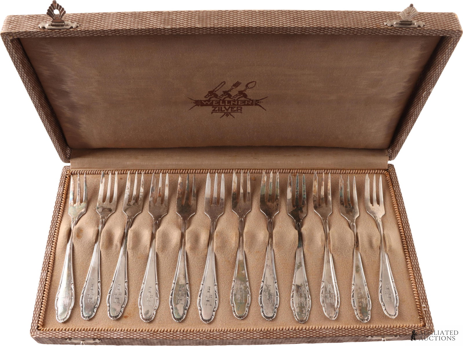 Set of Adolf Hitler Dessert Forks WWII German: Silver plated. Housed in wooden case. Marked Wellner 90. Reverse engraved Die Berghof. They measure 5 inches. | This lot has a reserve.